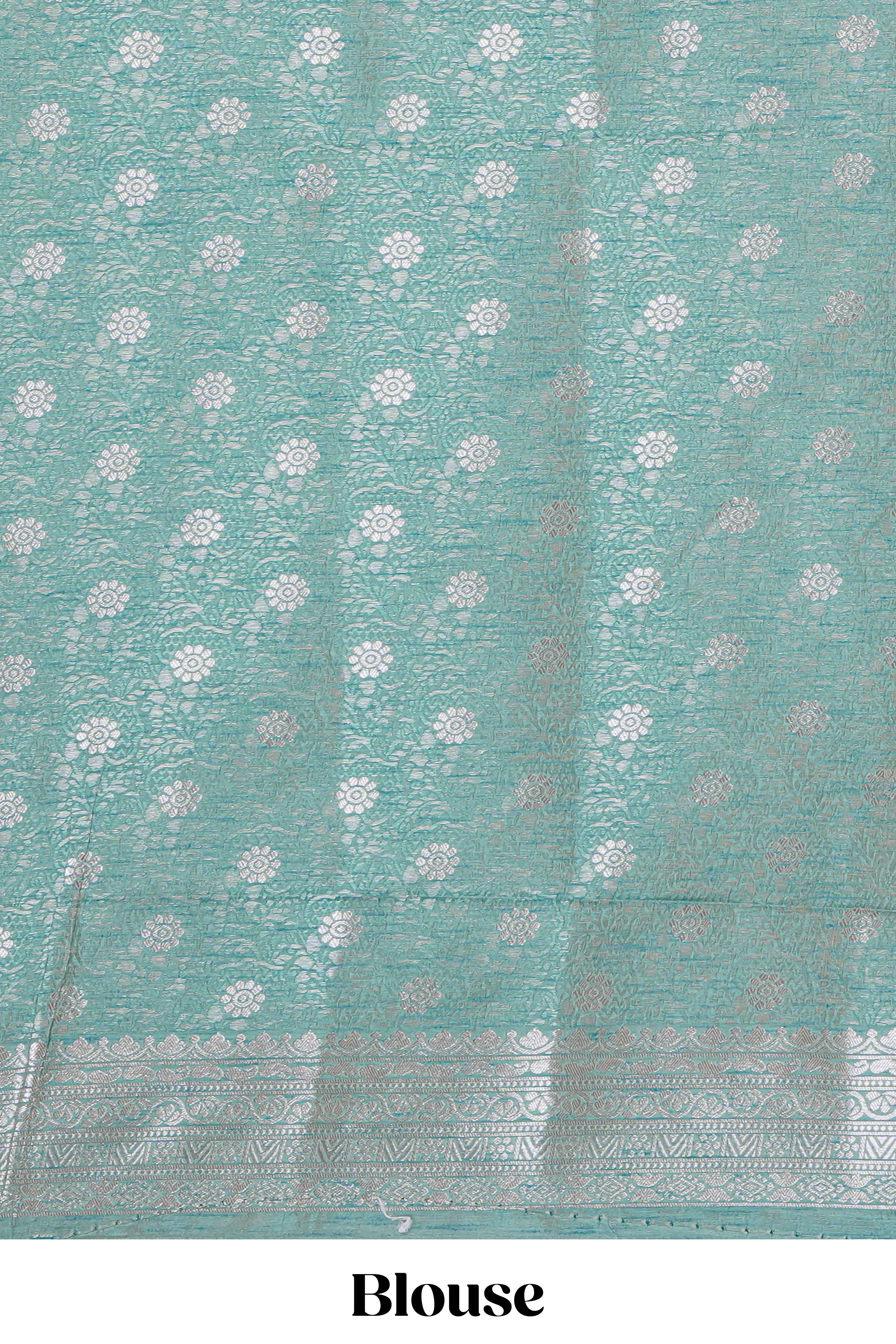Green floral zari design raw silk saree with self zari border and matching motifs blouse