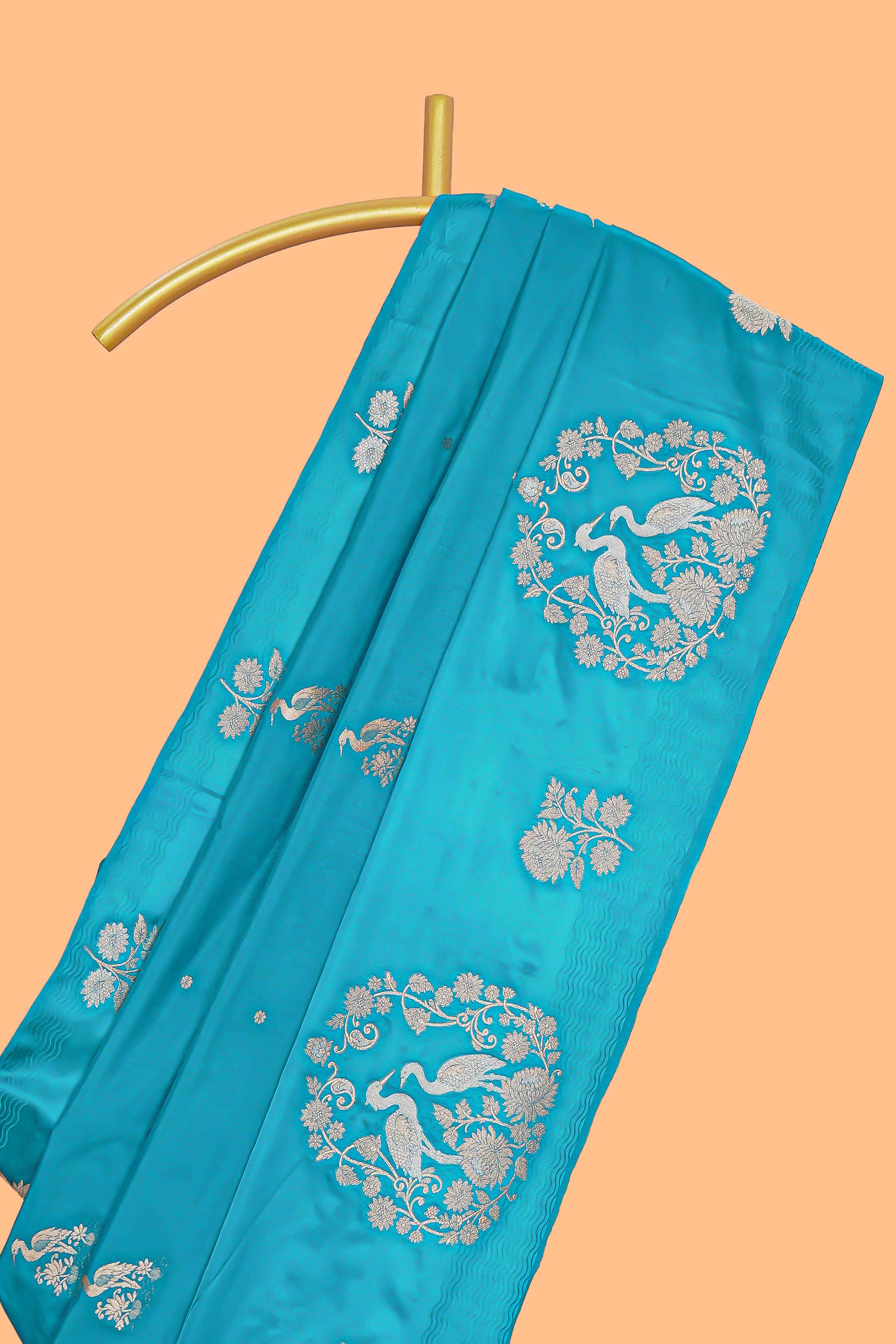 Blue floral zari motifs design raw silk saree with self zari border and matching blouse