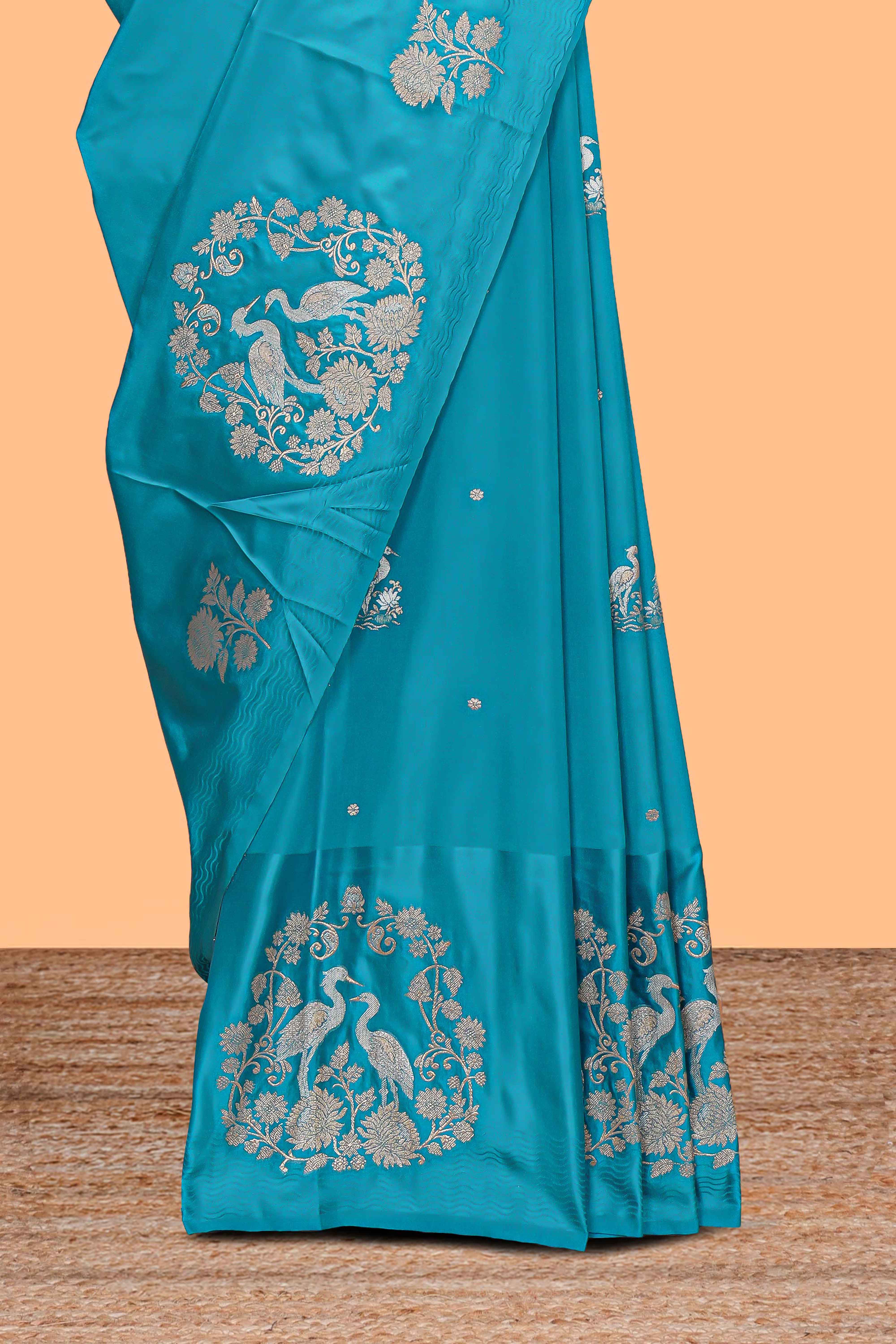 Blue floral zari motifs design raw silk saree with self zari border and matching blouse