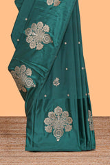 Green floral zari motifs design raw silk saree with self zari border and matching blouse