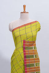 Green checked south cotton saree with contrast border and ikkat style pallu