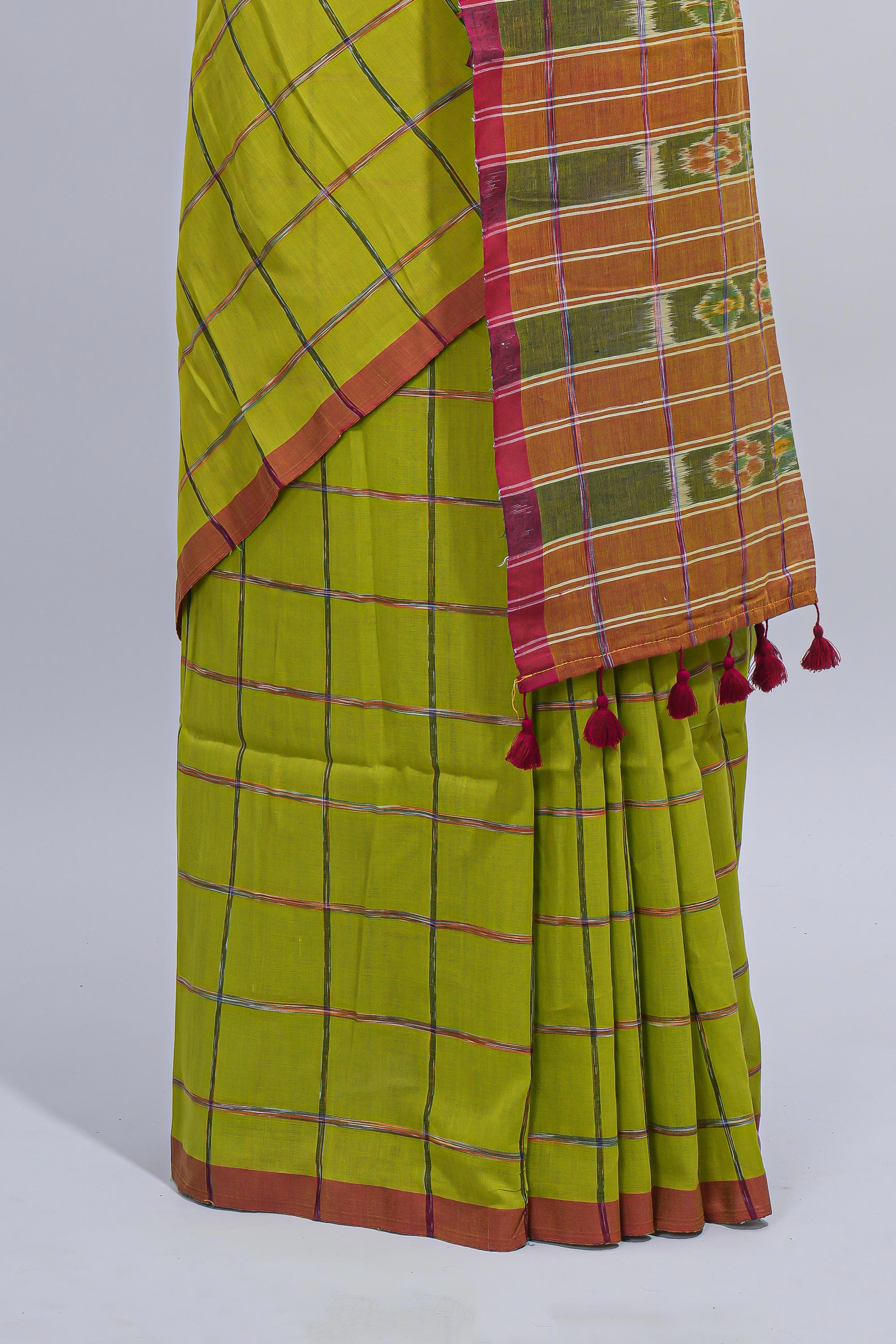 Green checked south cotton saree with contrast border and ikkat style pallu