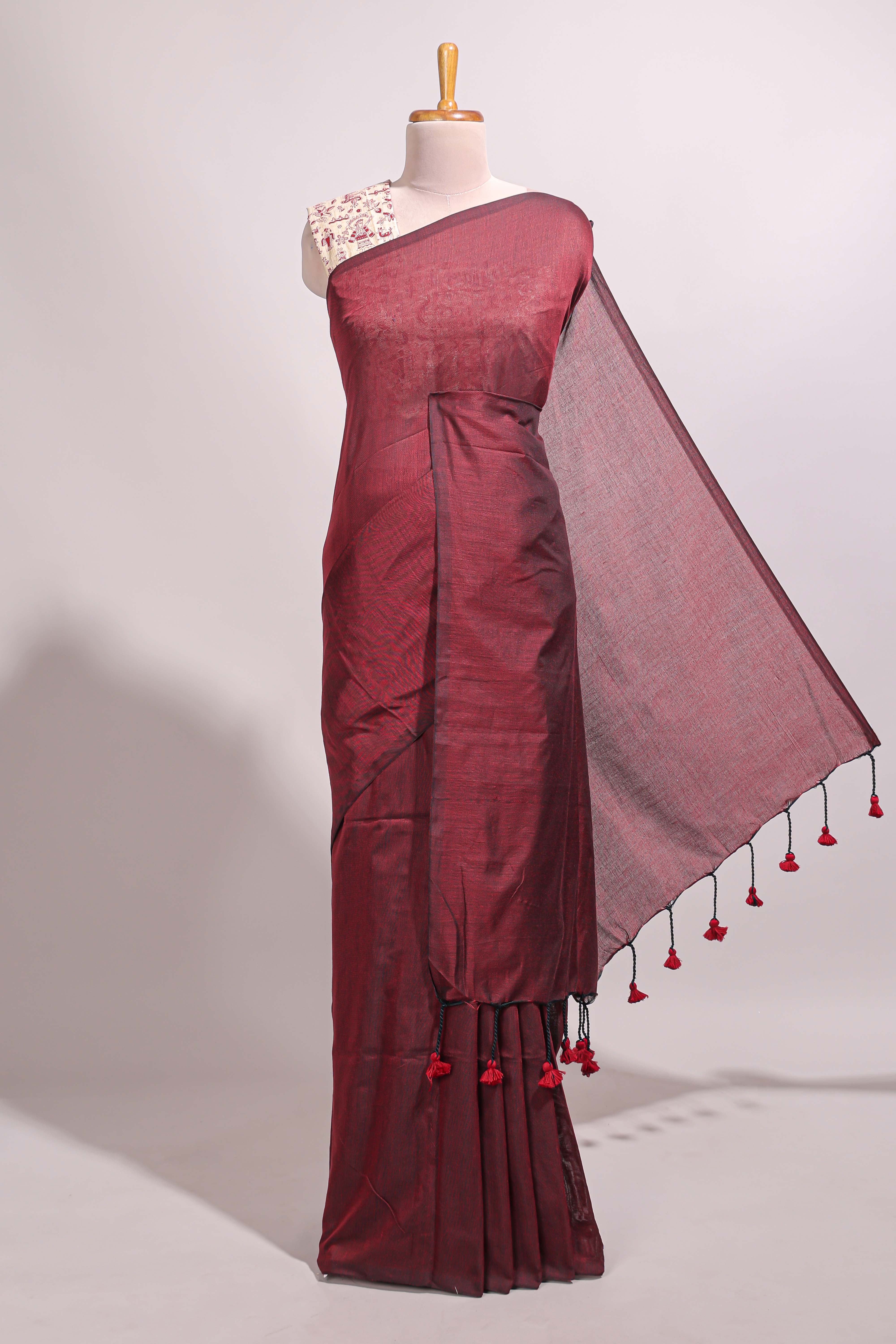 Deep red plain south cotton sarees with contrast warli printed blouse