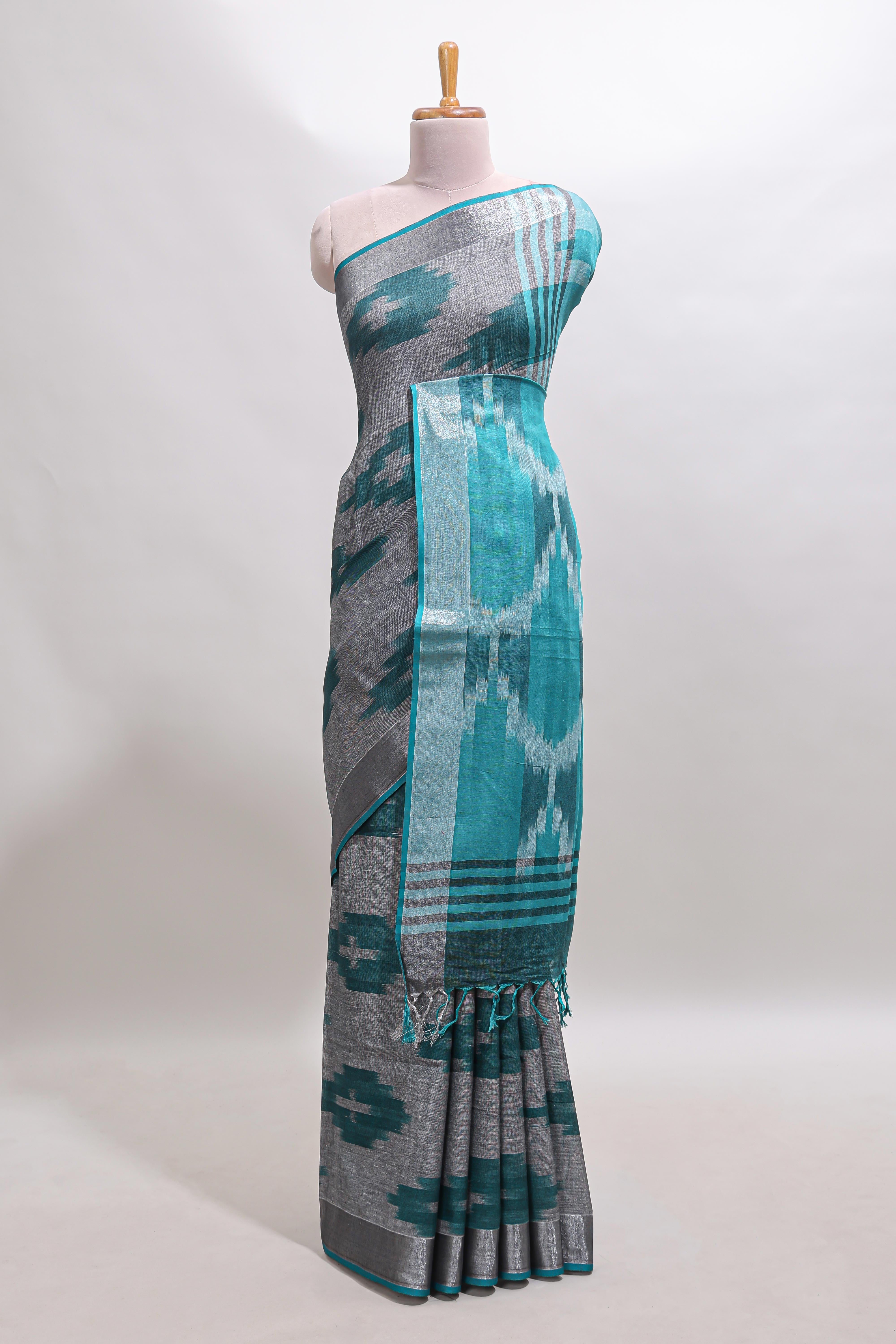 Grey ikkat style motifs south cotton saree with contrast silver zari border and blouse