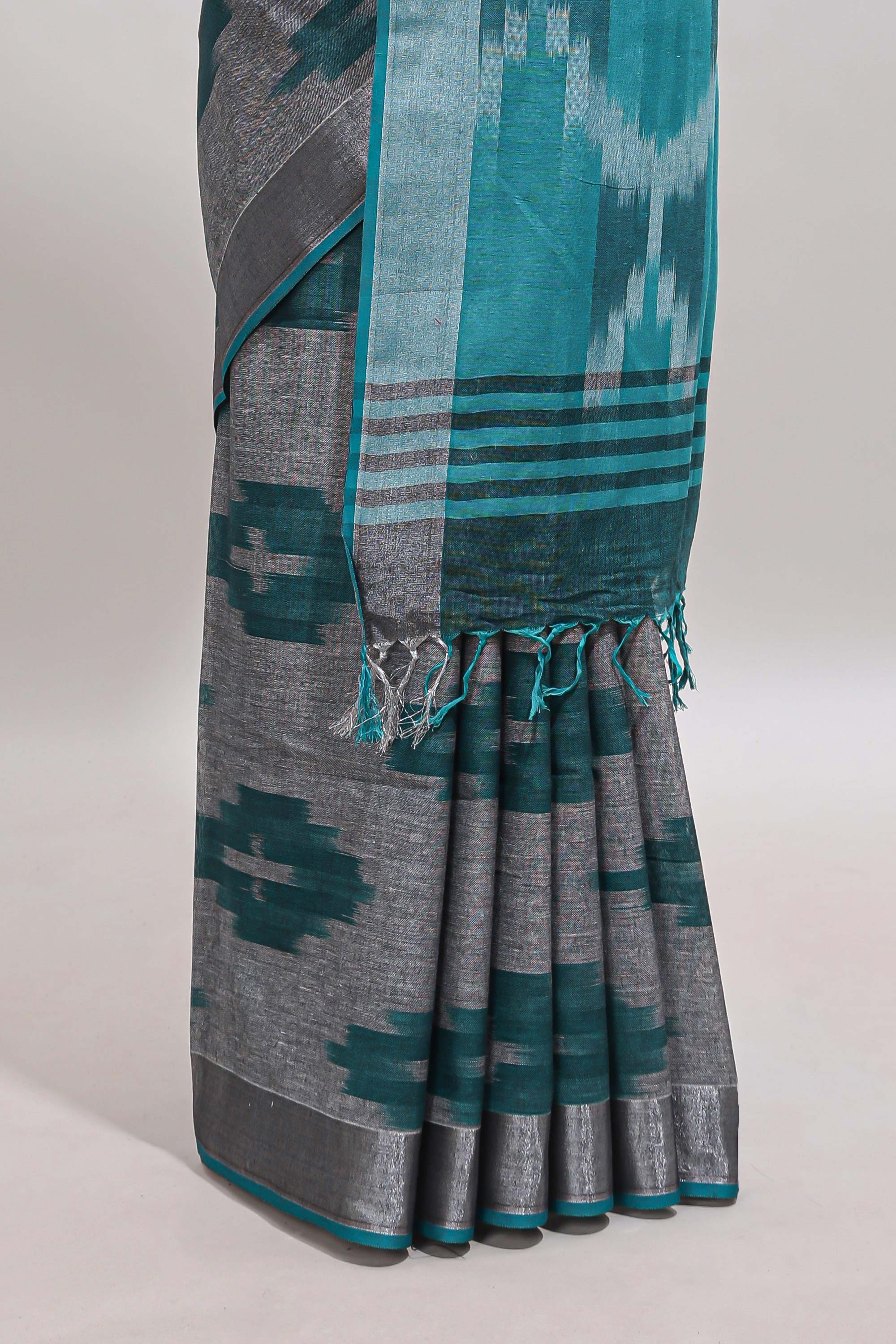 Grey ikkat style motifs south cotton saree with contrast silver zari border and blouse