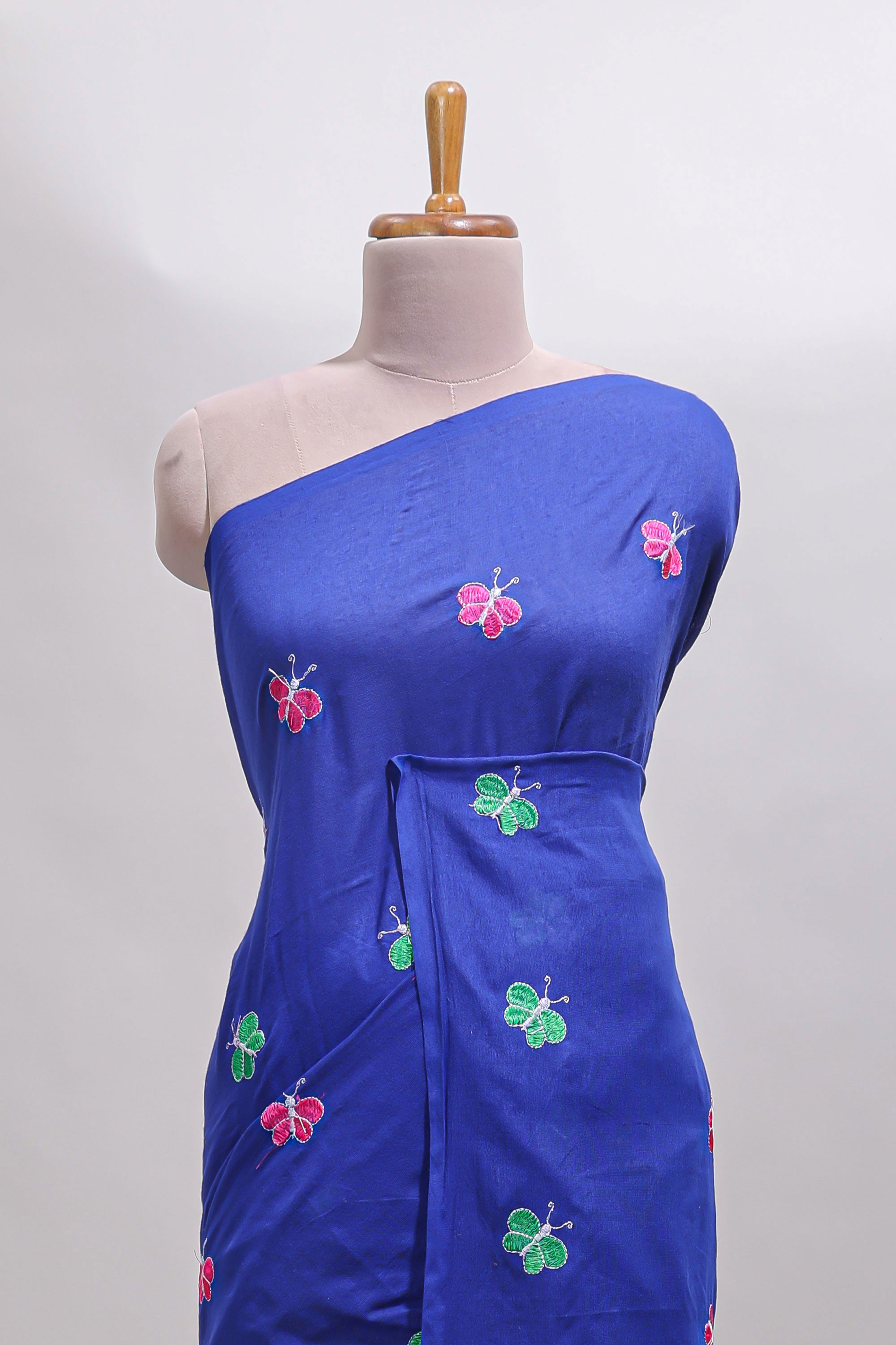 Borderless blue butterfly motifs south cotton saree with contrast blouse and tassels