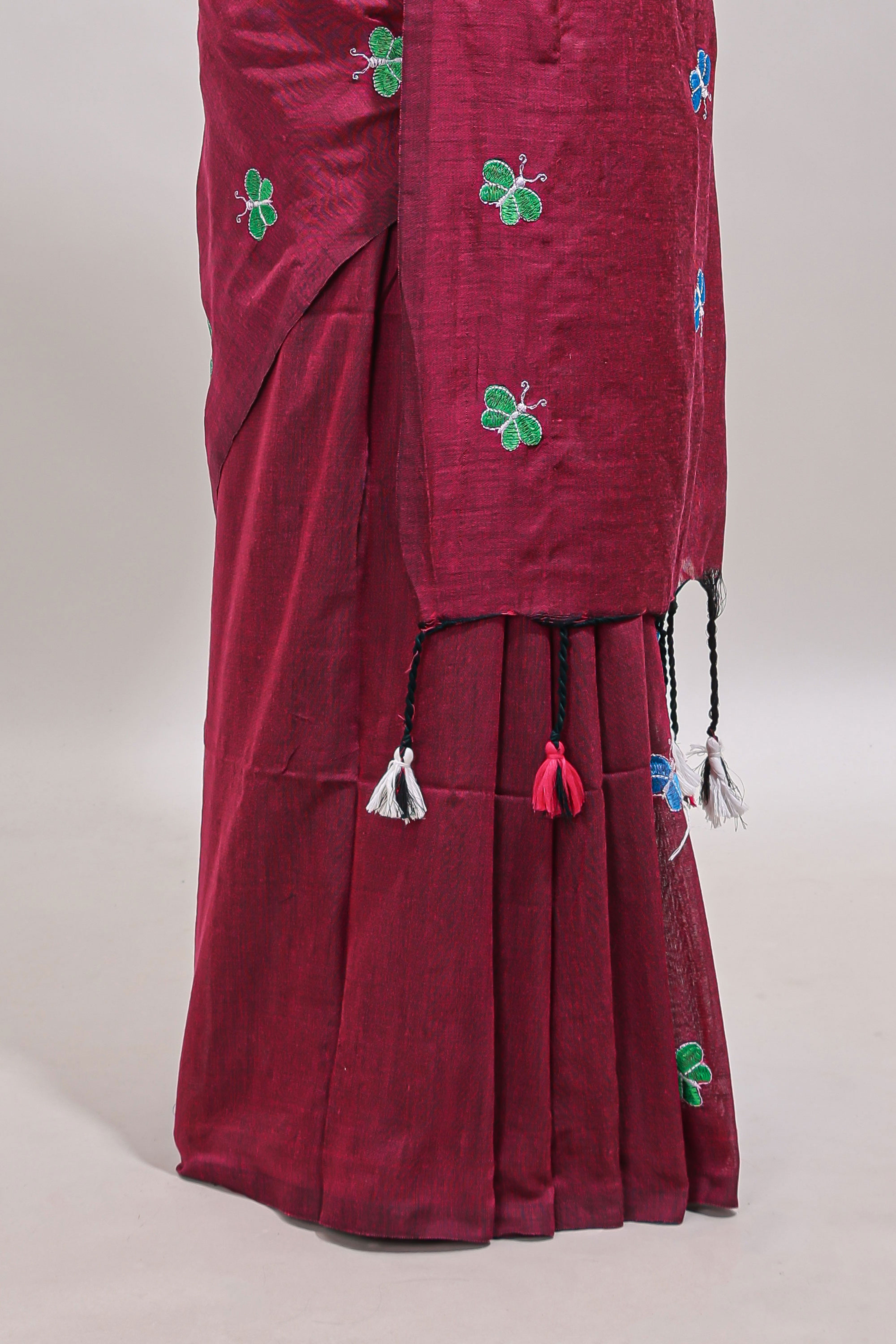 Borderless maroon butterfly motifs south cotton saree with contrast blouse and tassels