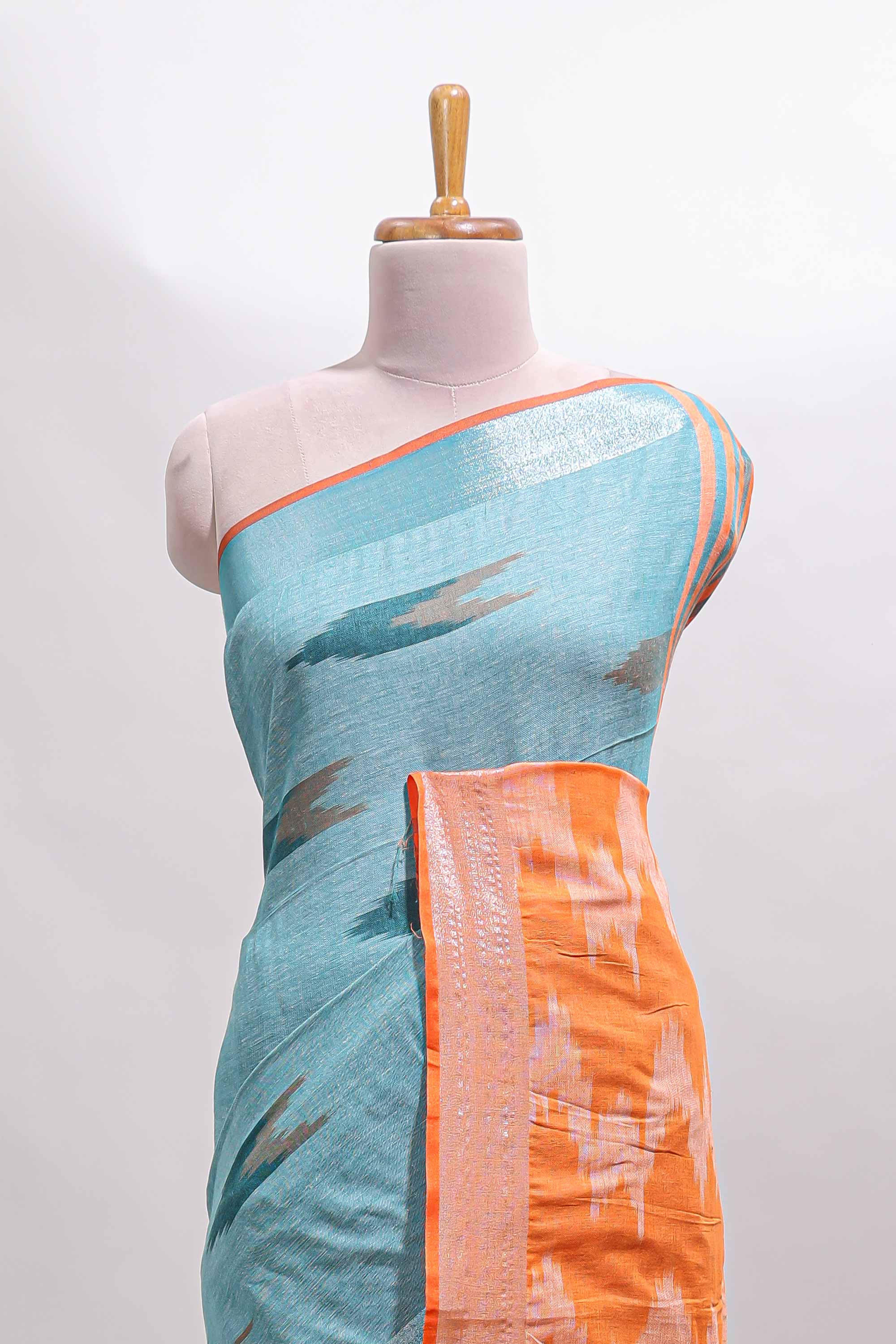 Blue ikkat style motifs south cotton saree with contrast border and blouse