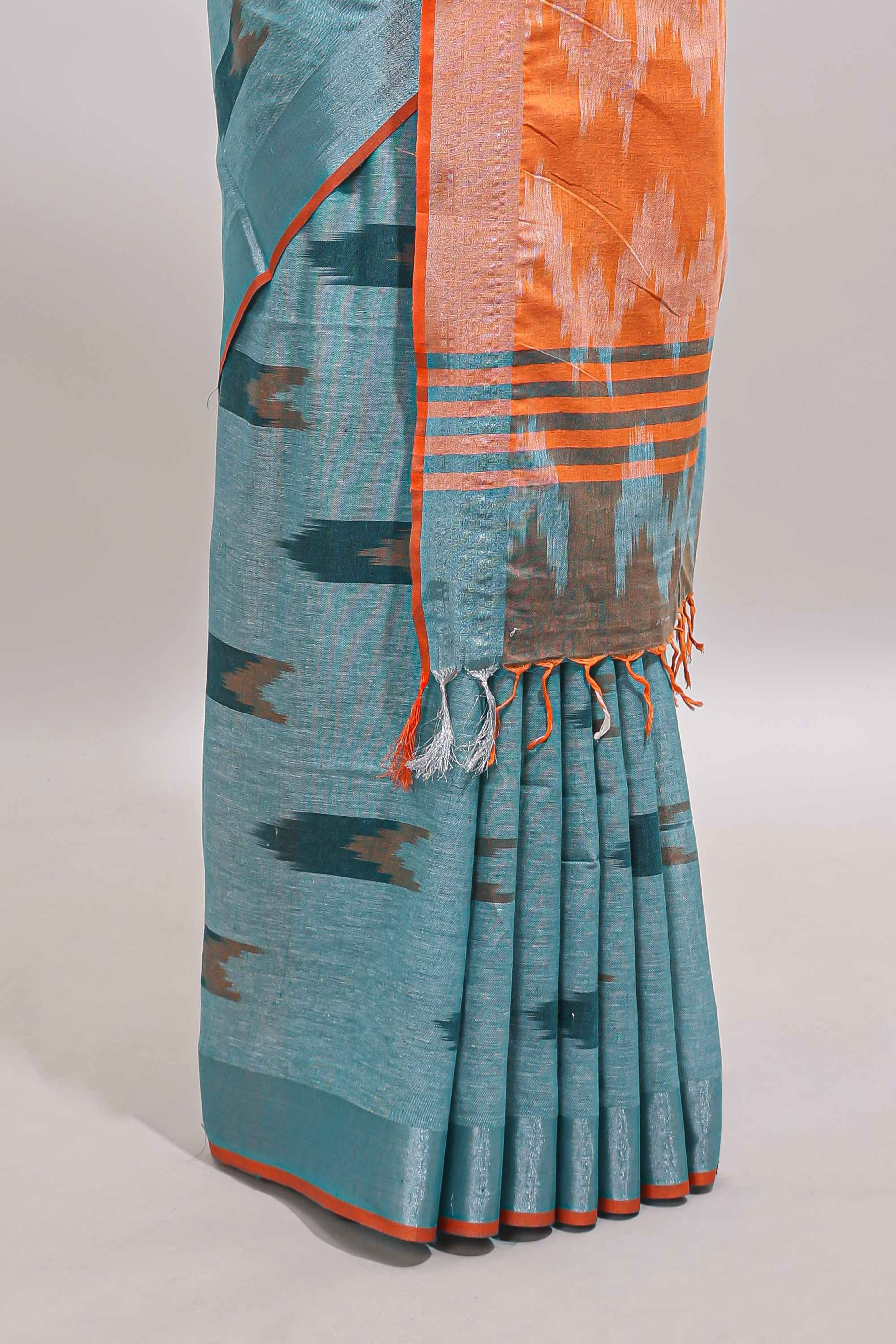 Blue ikkat style motifs south cotton saree with contrast border and blouse