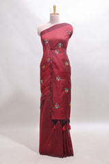 Maroon floral motifs south cotton sarees with self border and contrast printed blouse