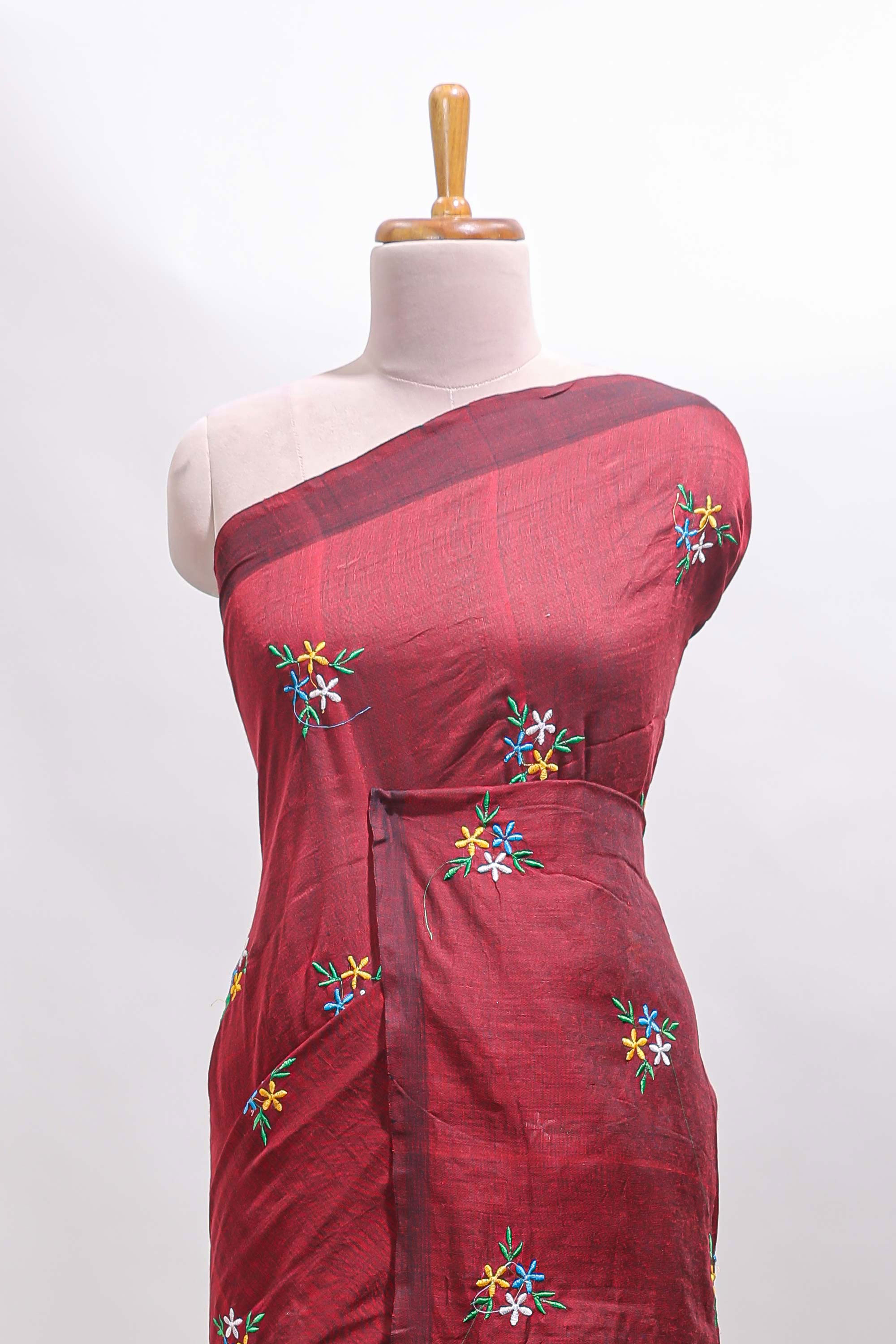 Maroon floral motifs south cotton sarees with self border and contrast printed blouse