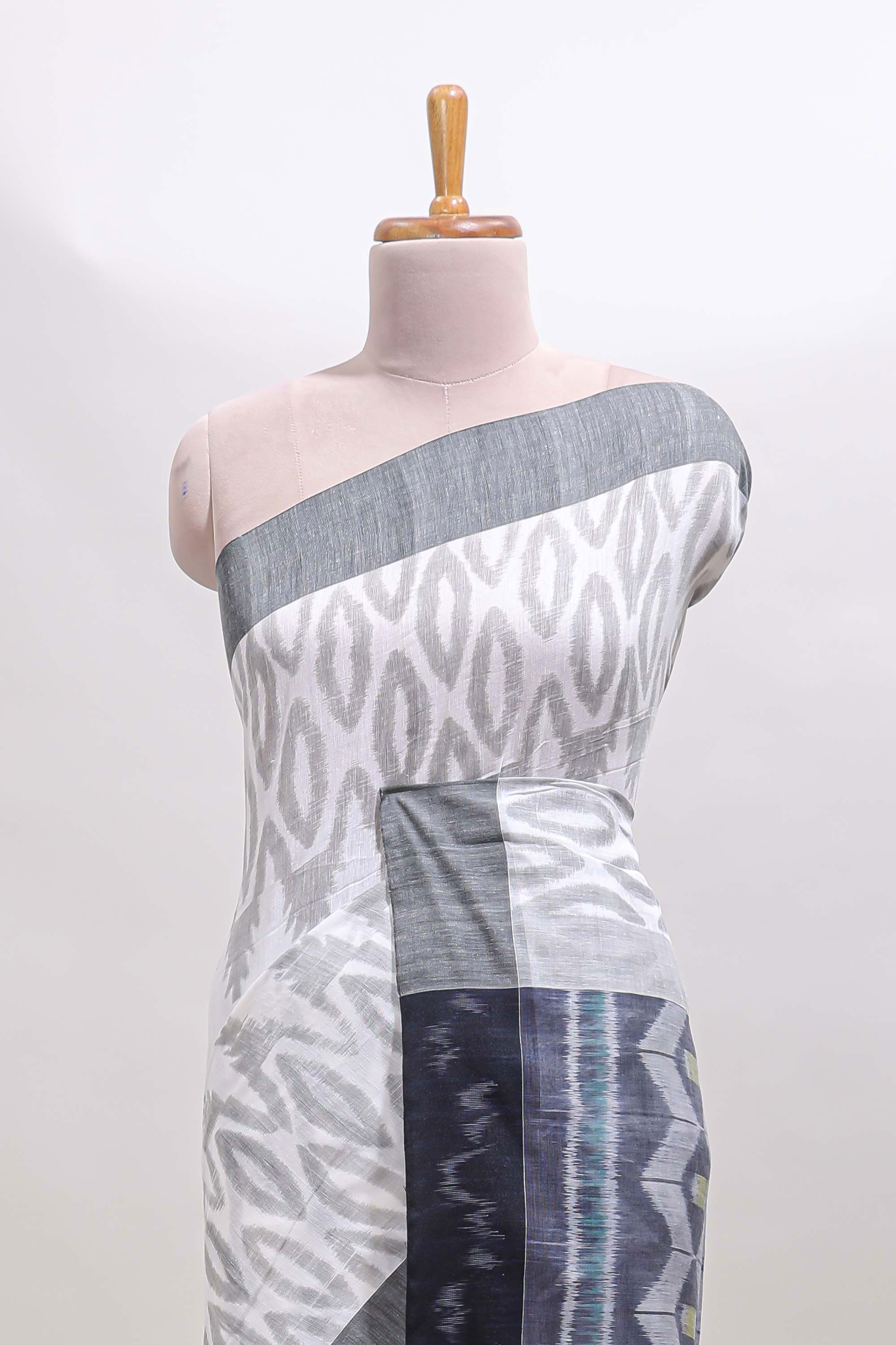 White geometric motifs south cotton sarees with contrast border and matching blouse