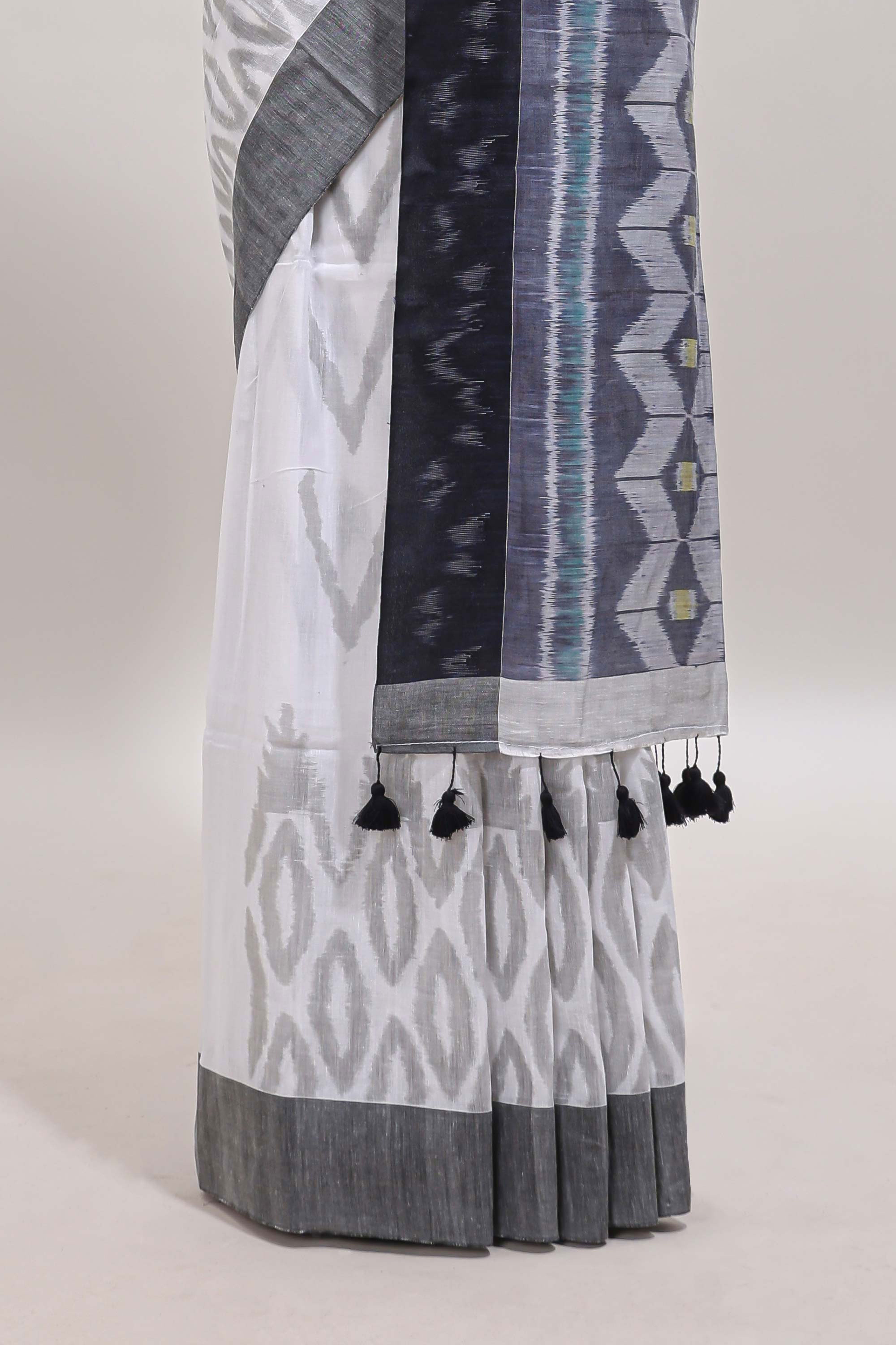 White geometric motifs south cotton sarees with contrast border and matching blouse