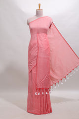 Borderless peach plain south cotton sarees with matching printed blouse and self pallu tassels