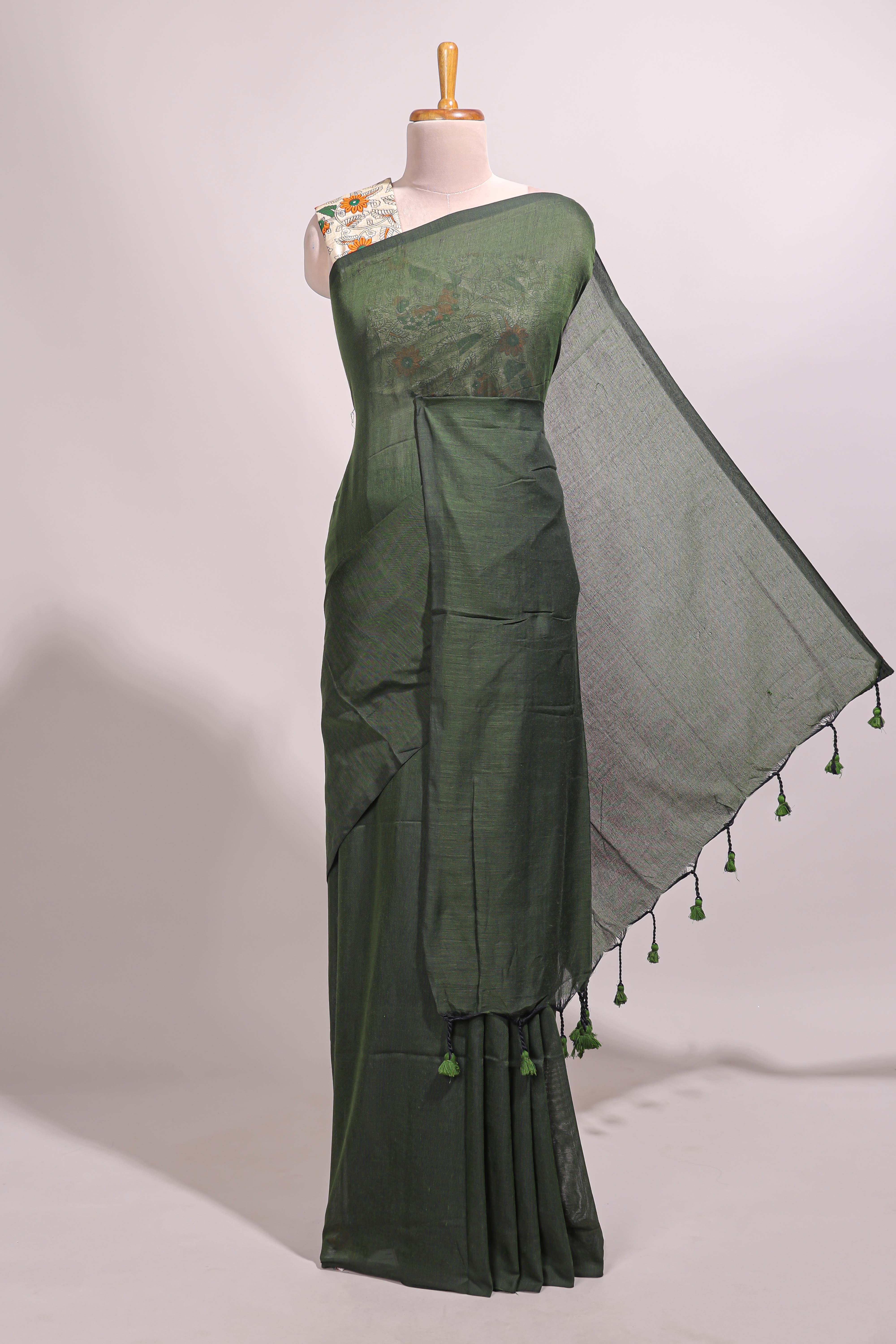 Dark green plain south cotton sarees with contrast floral printed blouse