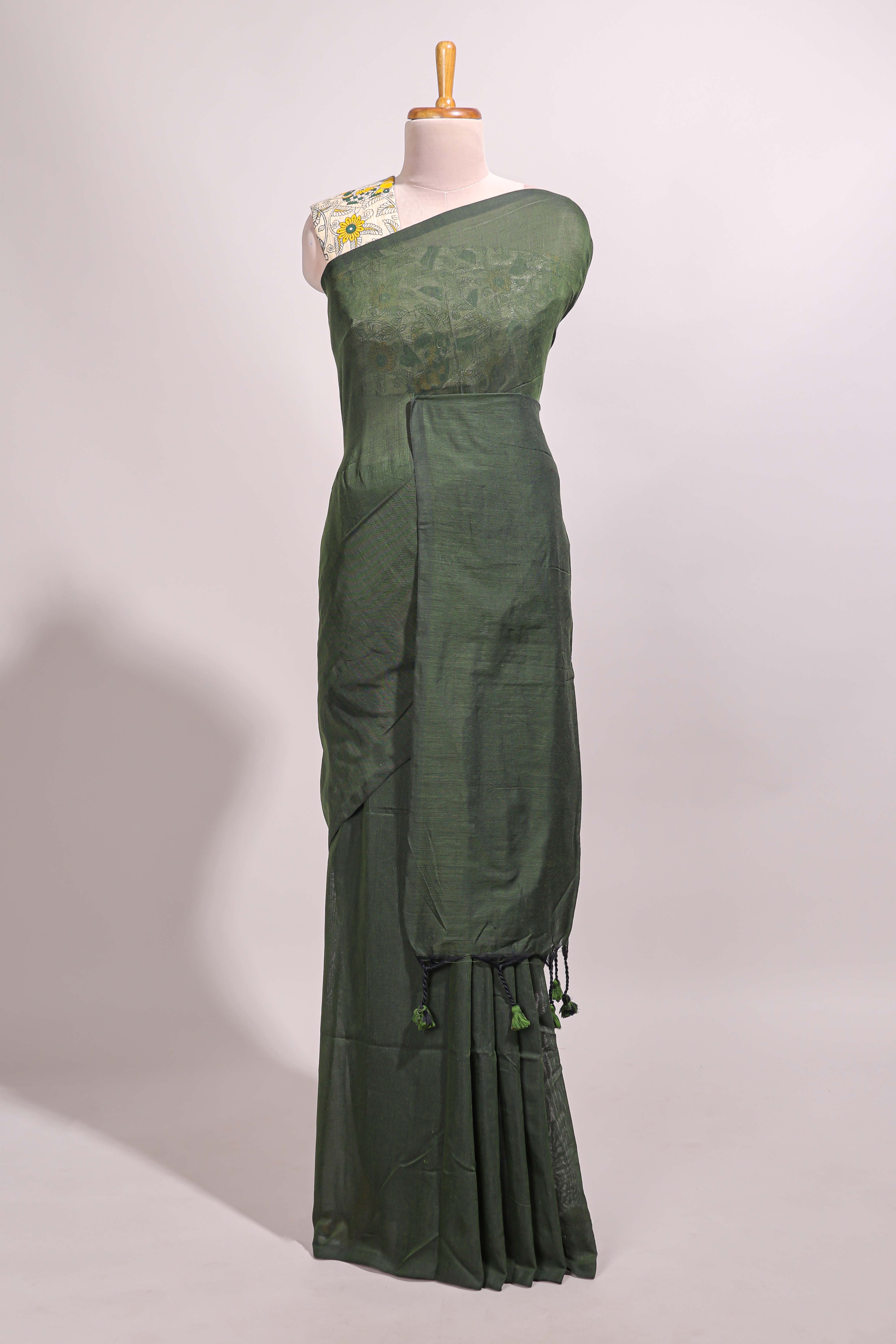 Deep green plain south cotton sarees with contrast floral printed blouse