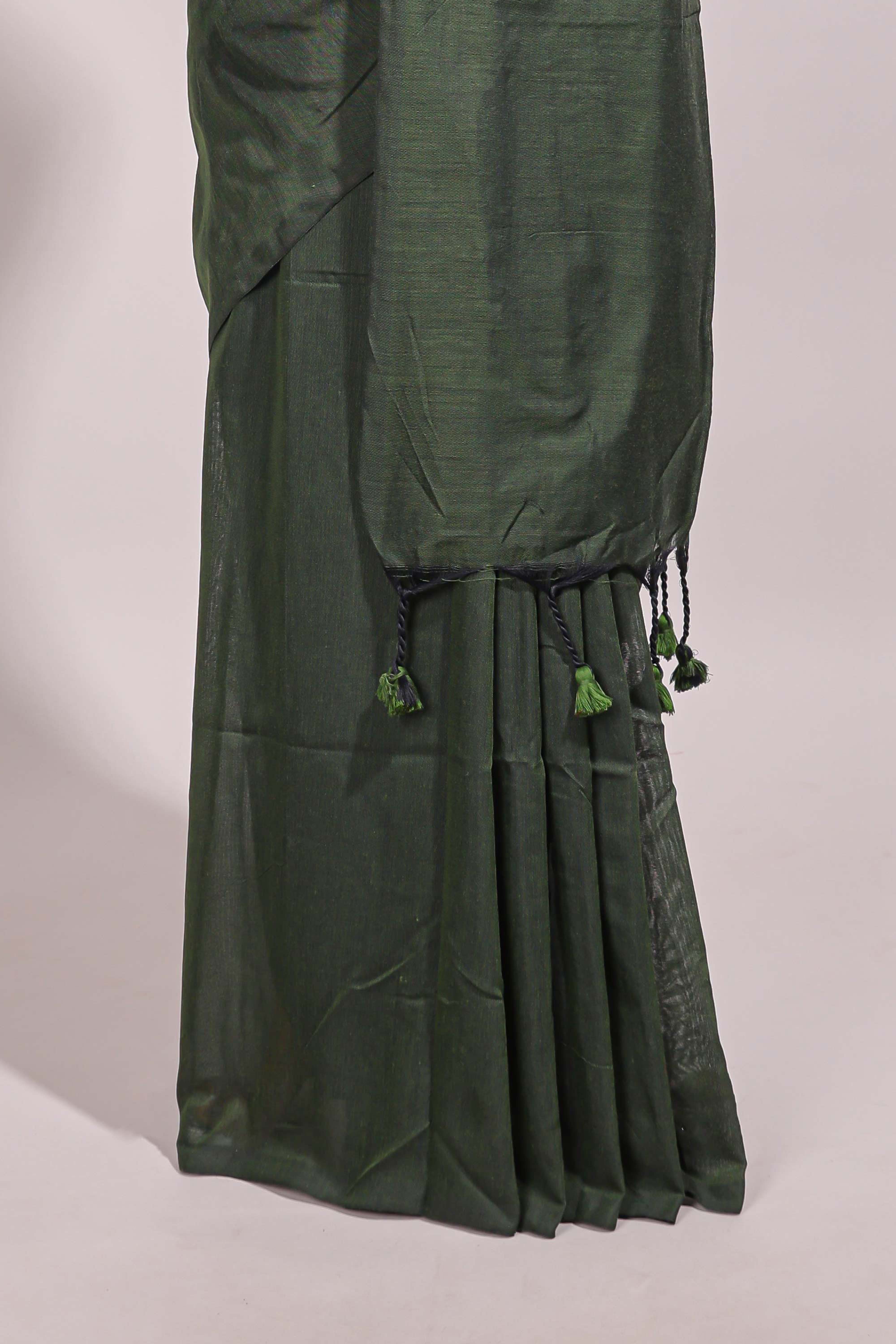 Deep green plain south cotton sarees with contrast floral printed blouse
