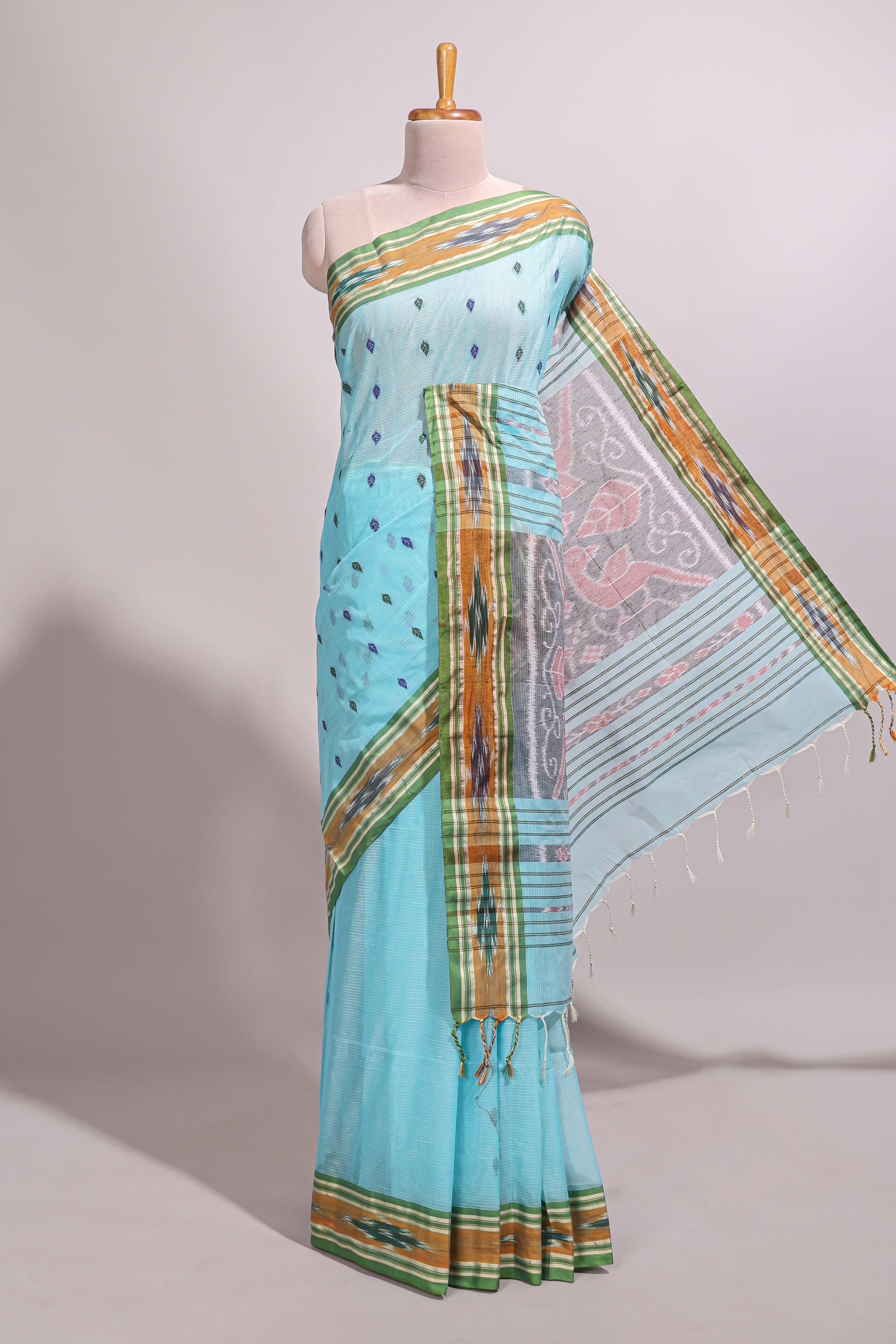 Pastel blue south cotton saree body with woven buttasborder featuring multicolour Ikat patterns woven pallu with a matching blouse