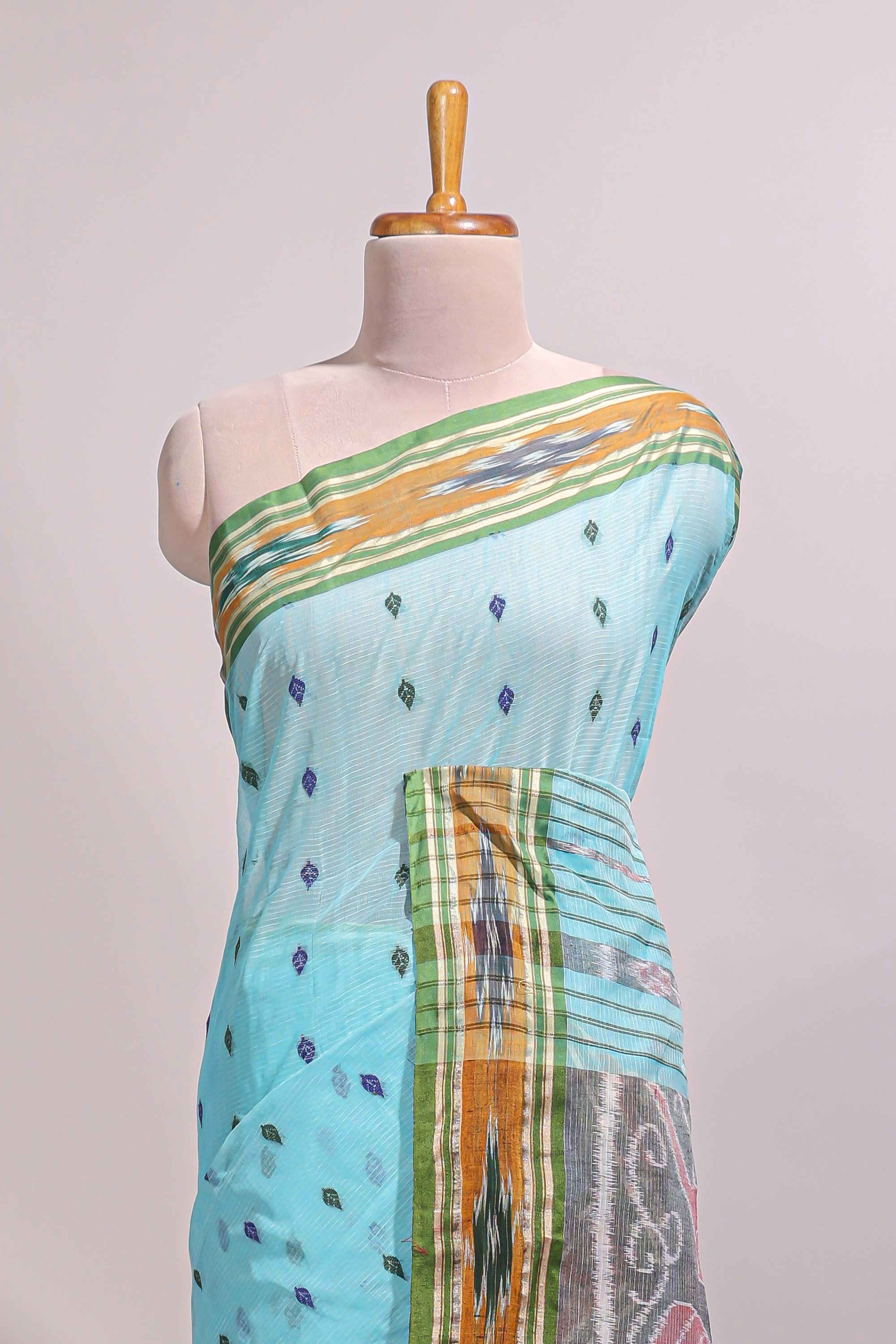 Pastel blue south cotton saree body with woven buttasborder featuring multicolour Ikat patterns woven pallu with a matching blouse