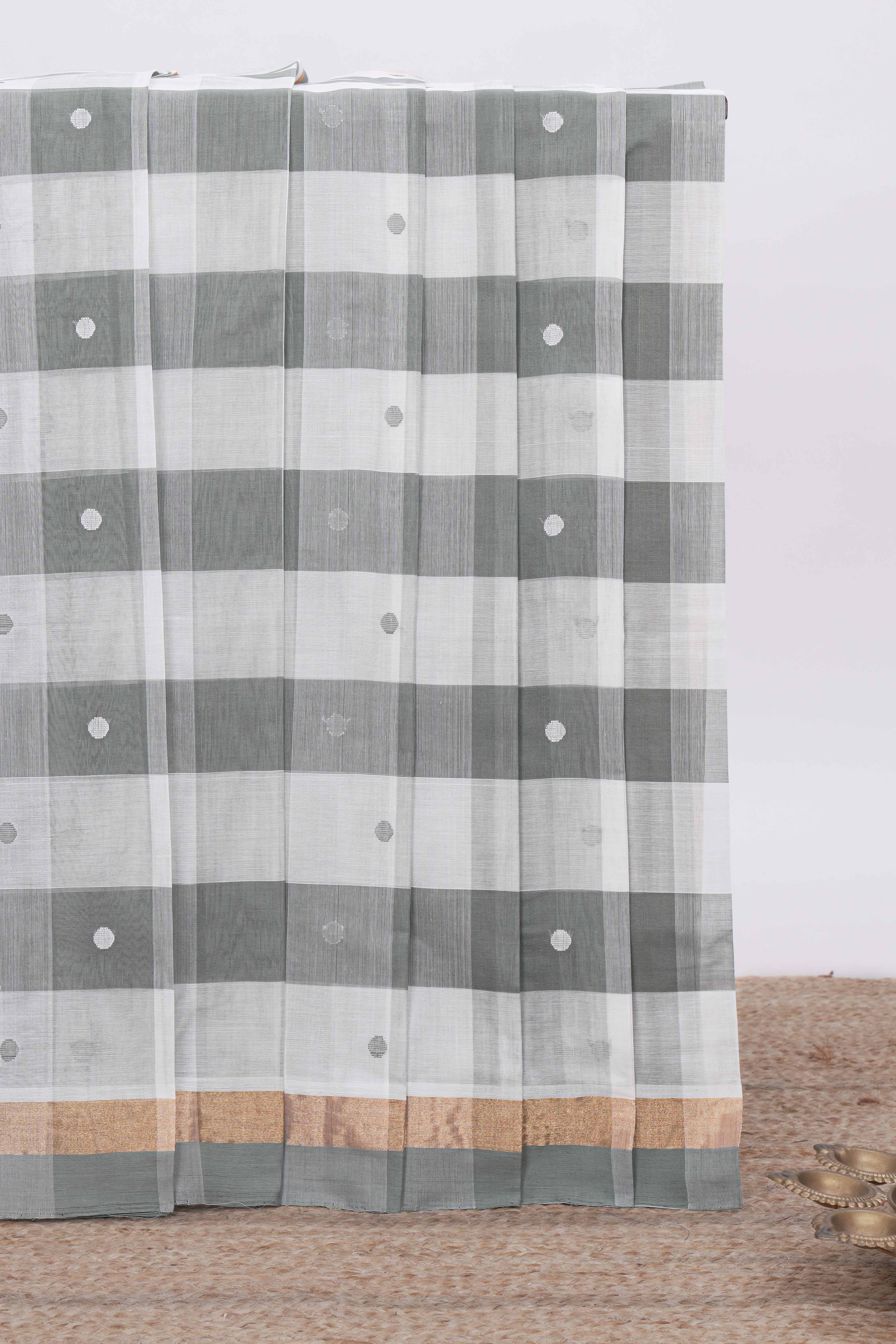Grey cheked floral motifs design south cotton saree with self zari border and matching pallu