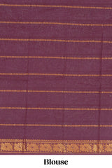 Pastel green Sungudi cotton saree with gold zari stripe motifs a contrastingzari border checked pallu and contrast blouse