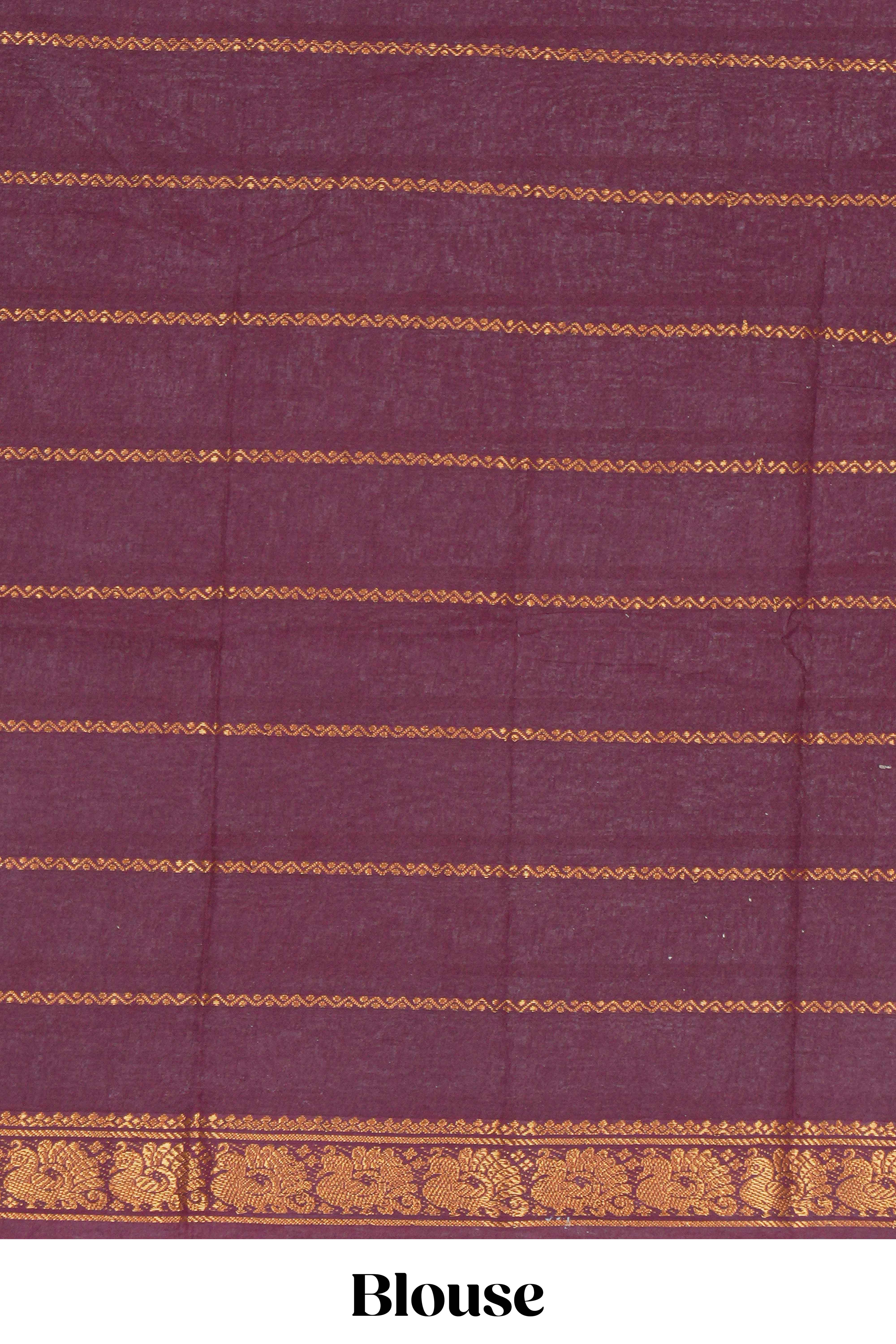 Pastel green Sungudi cotton saree with gold zari stripe motifs a contrastingzari border checked pallu and contrast blouse