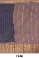 Navy blue Chettinad cotton saree with checked body contrasting peacock zari border striped pallu and a matching checked blouse