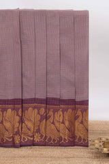 Muted Lavender Chettinad cotton saree with checked body contrasting peacock zari border striped pallu and blouse