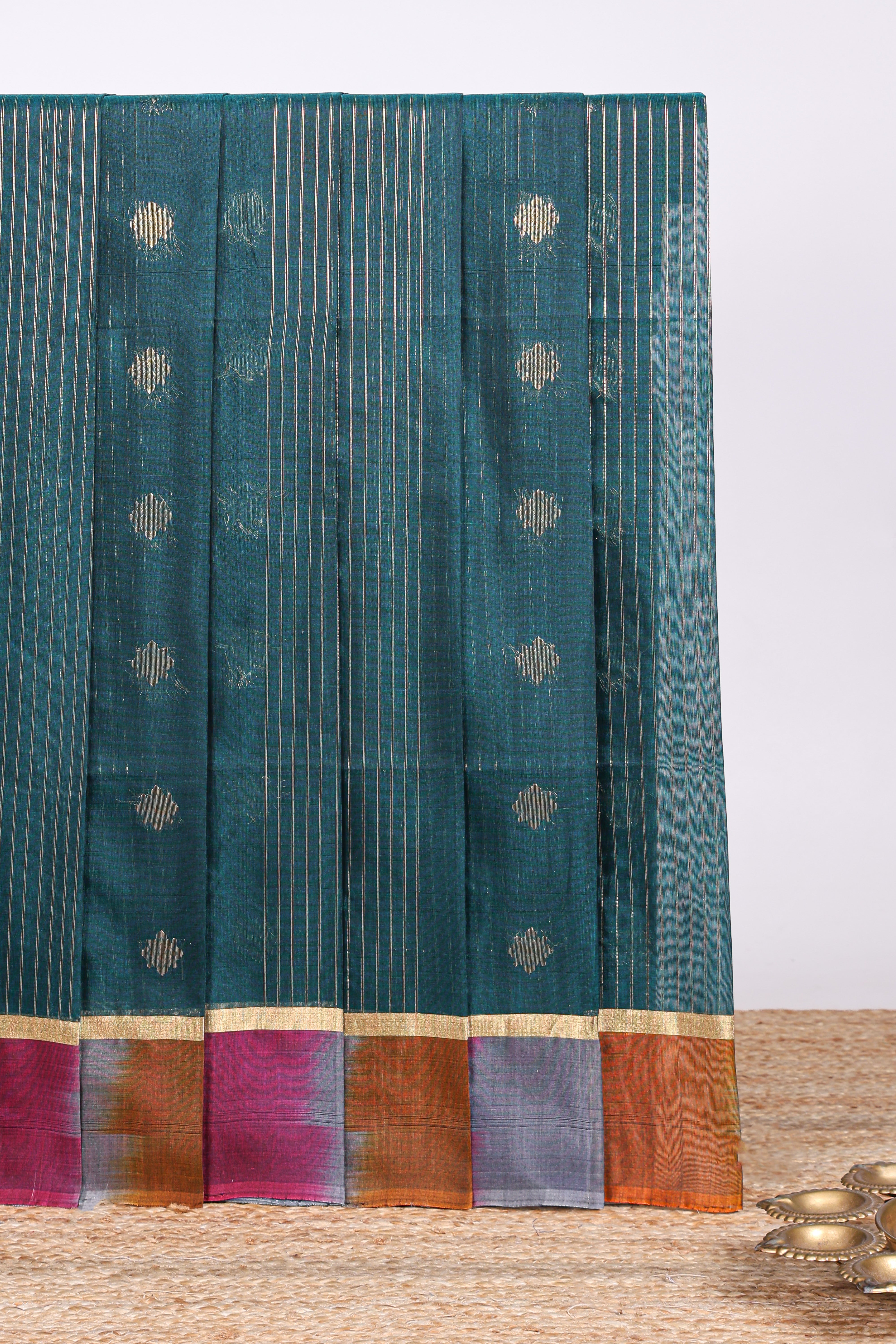 Pine green striped zari motifs design silk cotton saree with contrast zari border and blouse