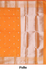 Bright orange butta designed silk cotton saree with self zari border and blouse