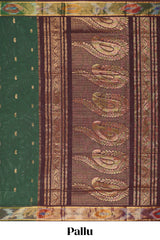 Dark green butta designed silk cotton saree with self zari border and contrast blouse
