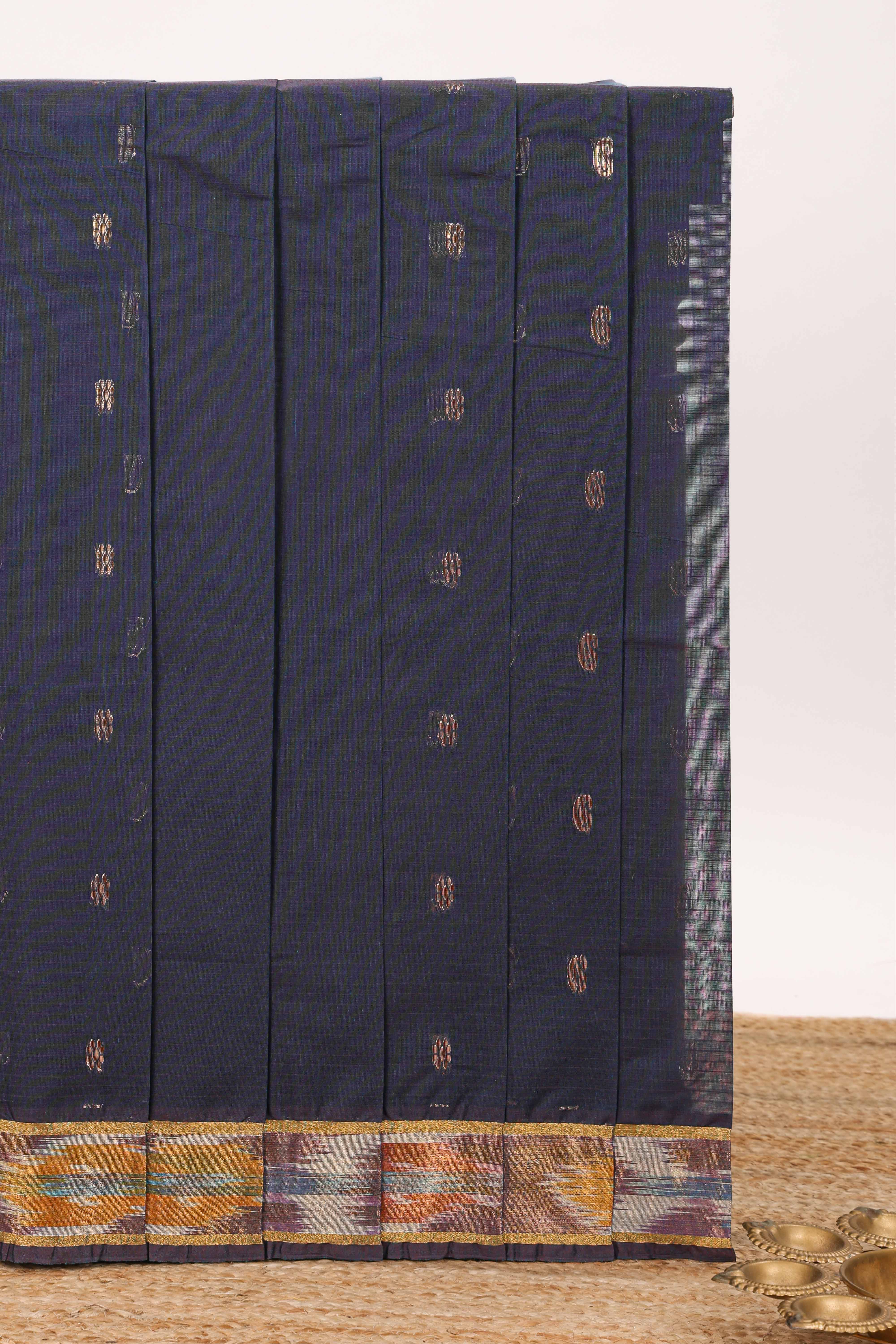 Dark blue butta designed silk cotton saree with self zari border and contrast blouse