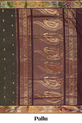 Brown butta designed silk cotton saree with self zari border and contrast blouse