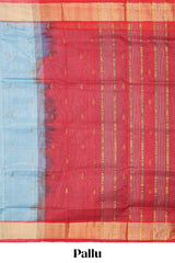 Light blue butta designed silk cotton saree with contrast zari border and blouse