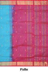Blue butta designed silk cotton saree with contrast zari border and blouse