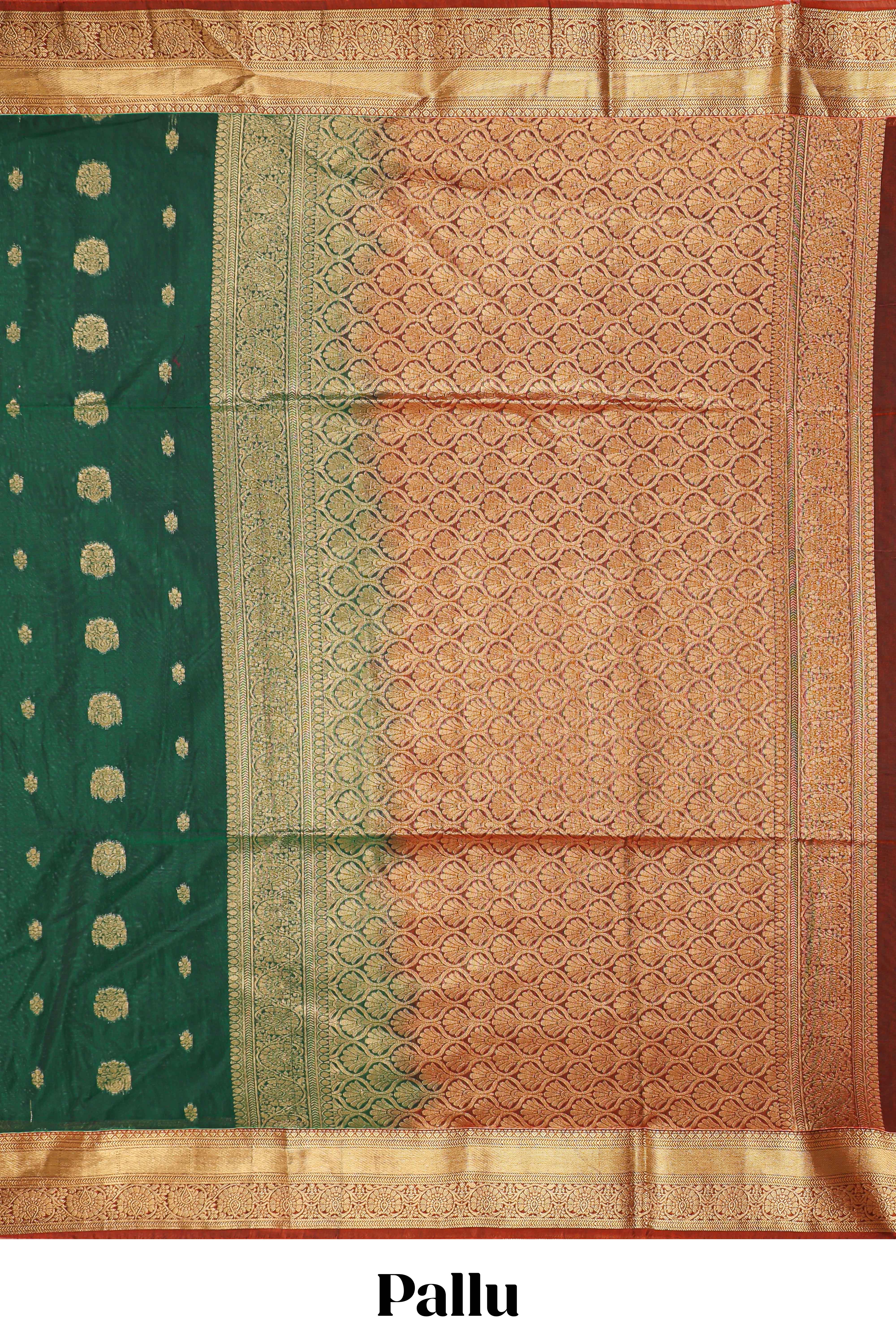 Dark green butta designed silk cotton saree with contrast zari border and blouse