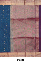 Blue butta designed silk cotton saree with contrast zari border and contrast blouse