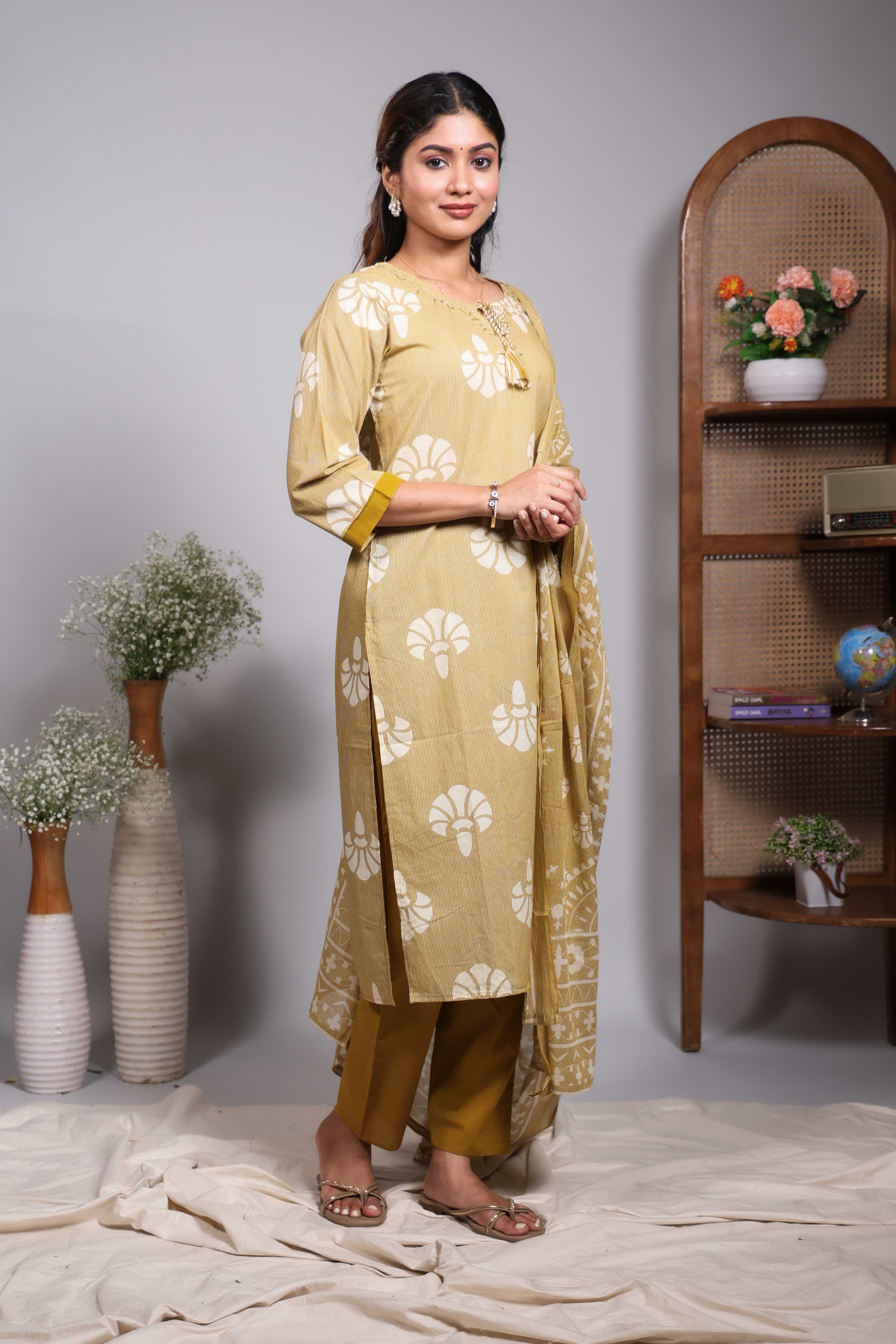 Sandal floral motifs design V neck salwar set with 3/4th sleeve, contrast bottom and matching dupatta
