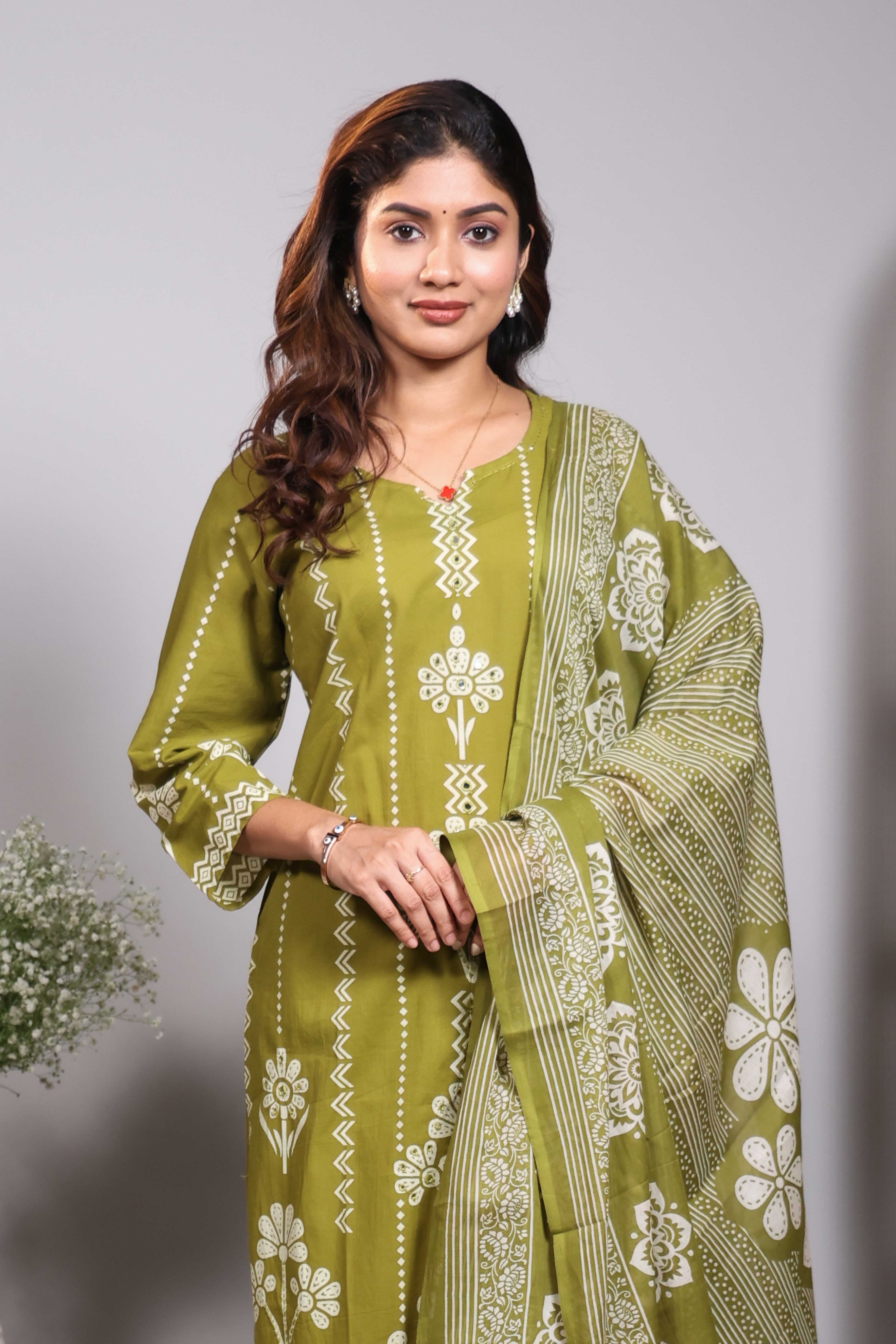Green striped floral motifs design V neck salwar set with 3/4th sleeve, self bottom and matching dupatta