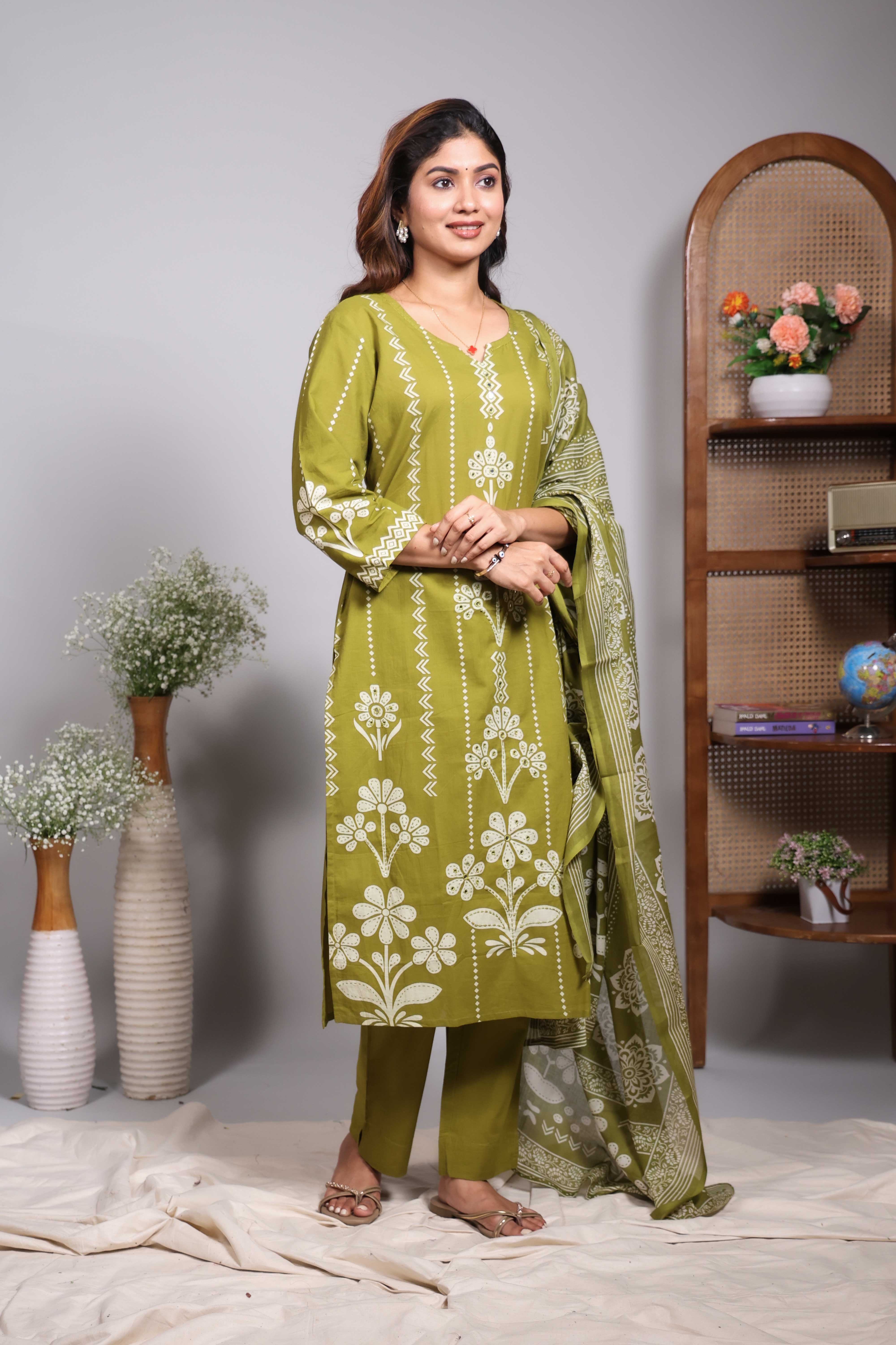 Green striped floral motifs design V neck salwar set with 3/4th sleeve, self bottom and matching dupatta