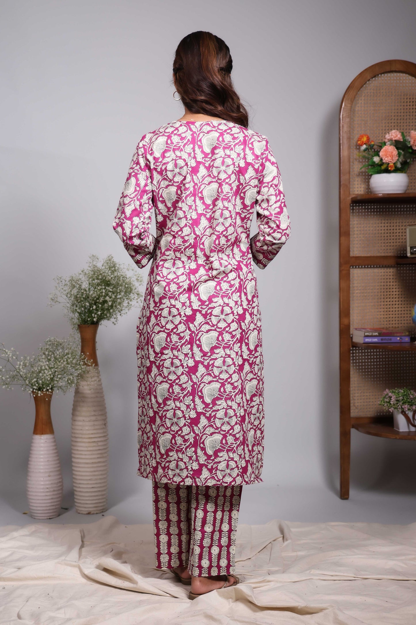 Pink floral design round neck salwar set with 3/4th sleeve, self bottom and matching dupatta