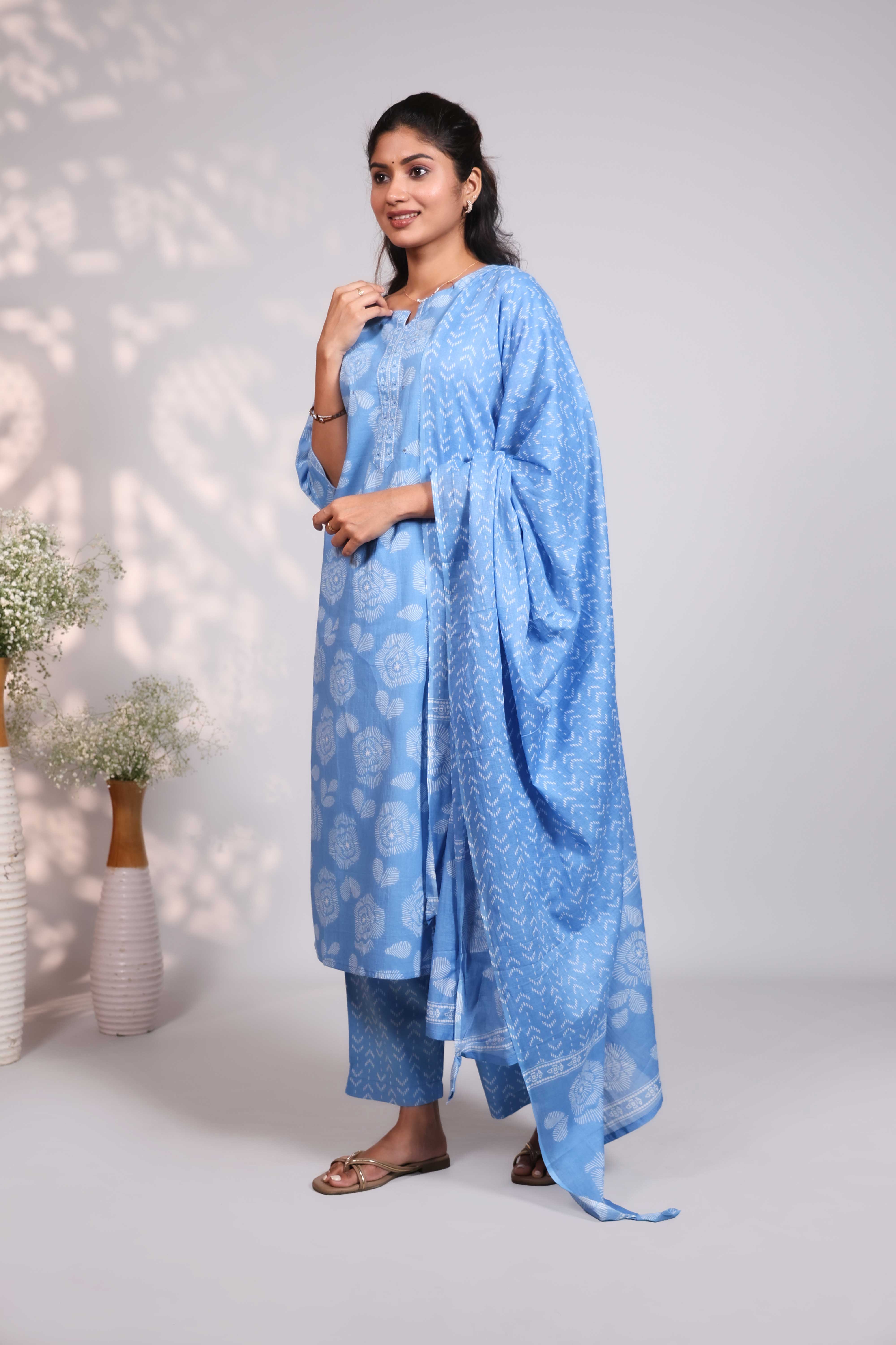 Blue floral design motifs round neck salwar set with 3/4th sleeve, self bottom and matching dupatta