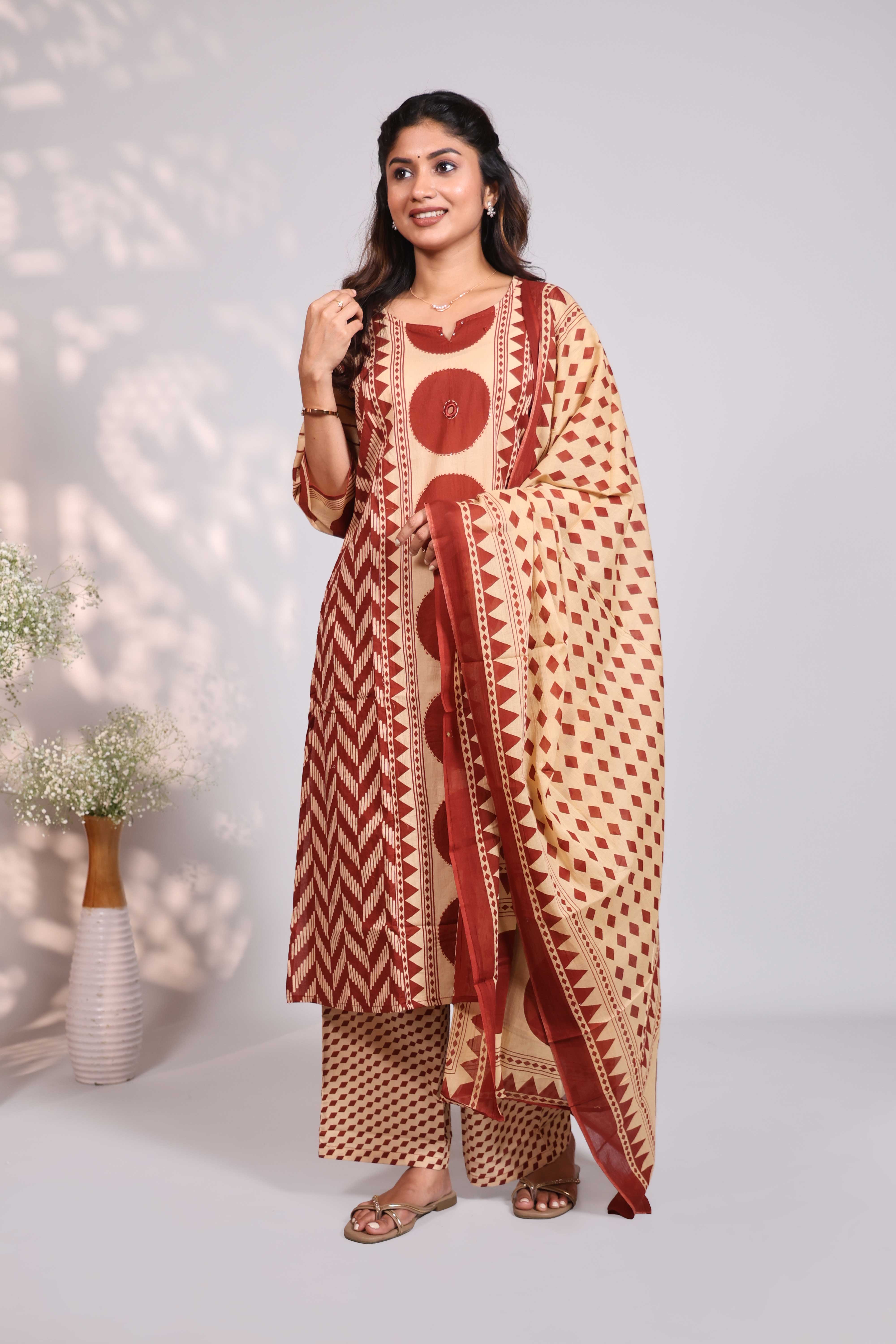 Sandal geometric motifs design round neck salwar set with 3/4th sleeve, self bottom and matching dupatta