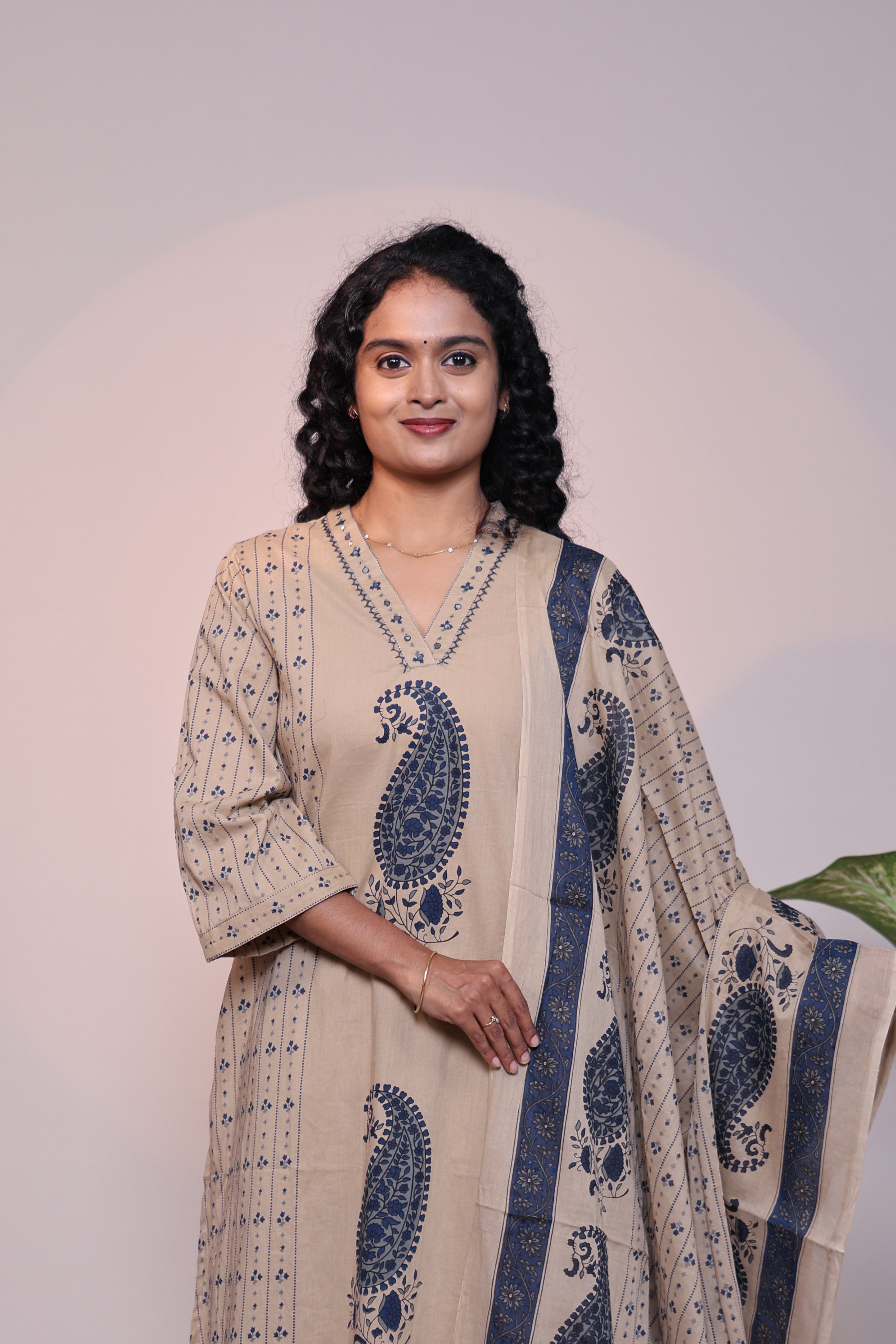 Light brown floral motifs 3/4 slevee salwar suit with matching pant and printed dupatta