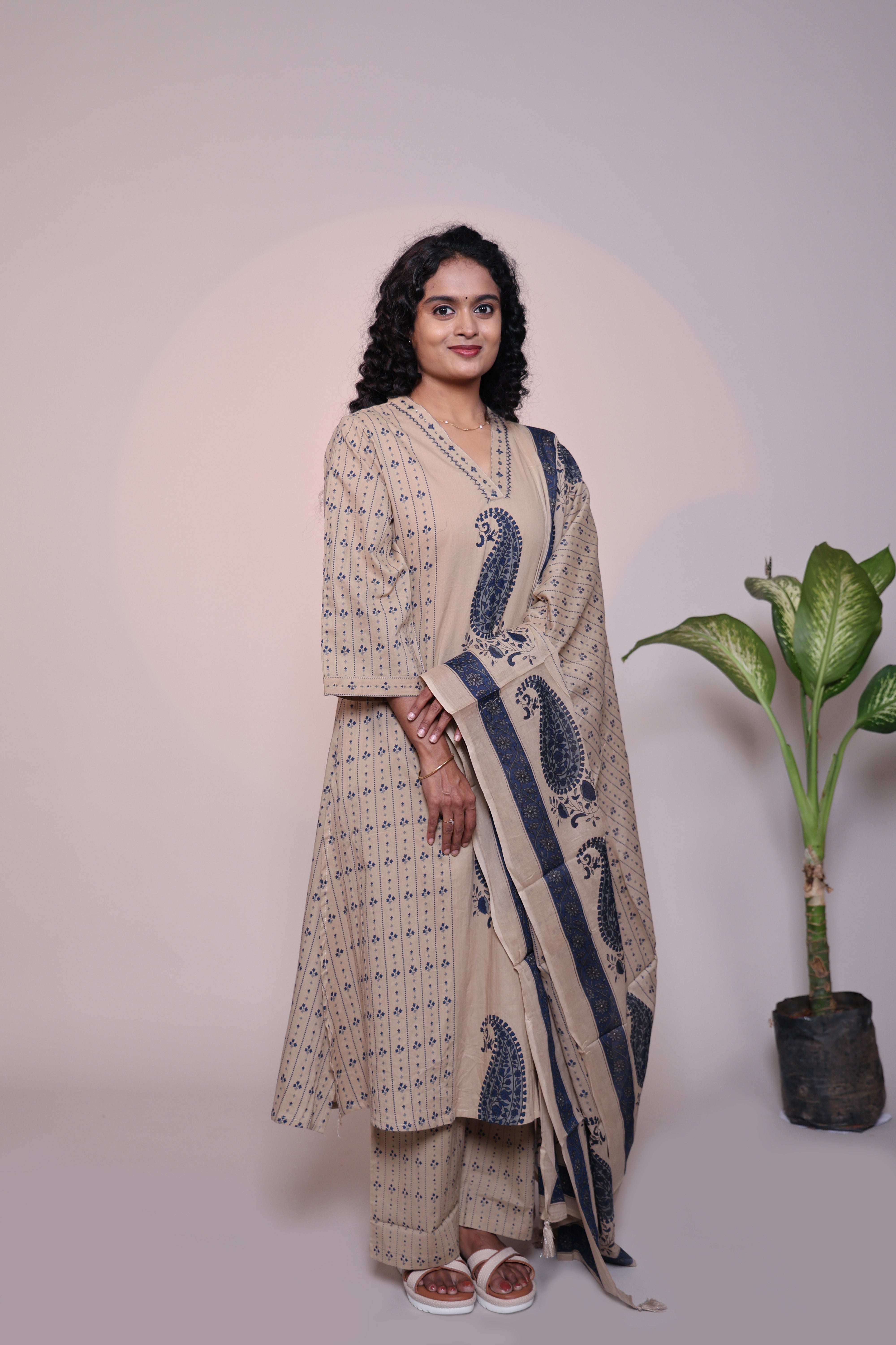 Light brown floral motifs 3/4 slevee salwar suit with matching pant and printed dupatta