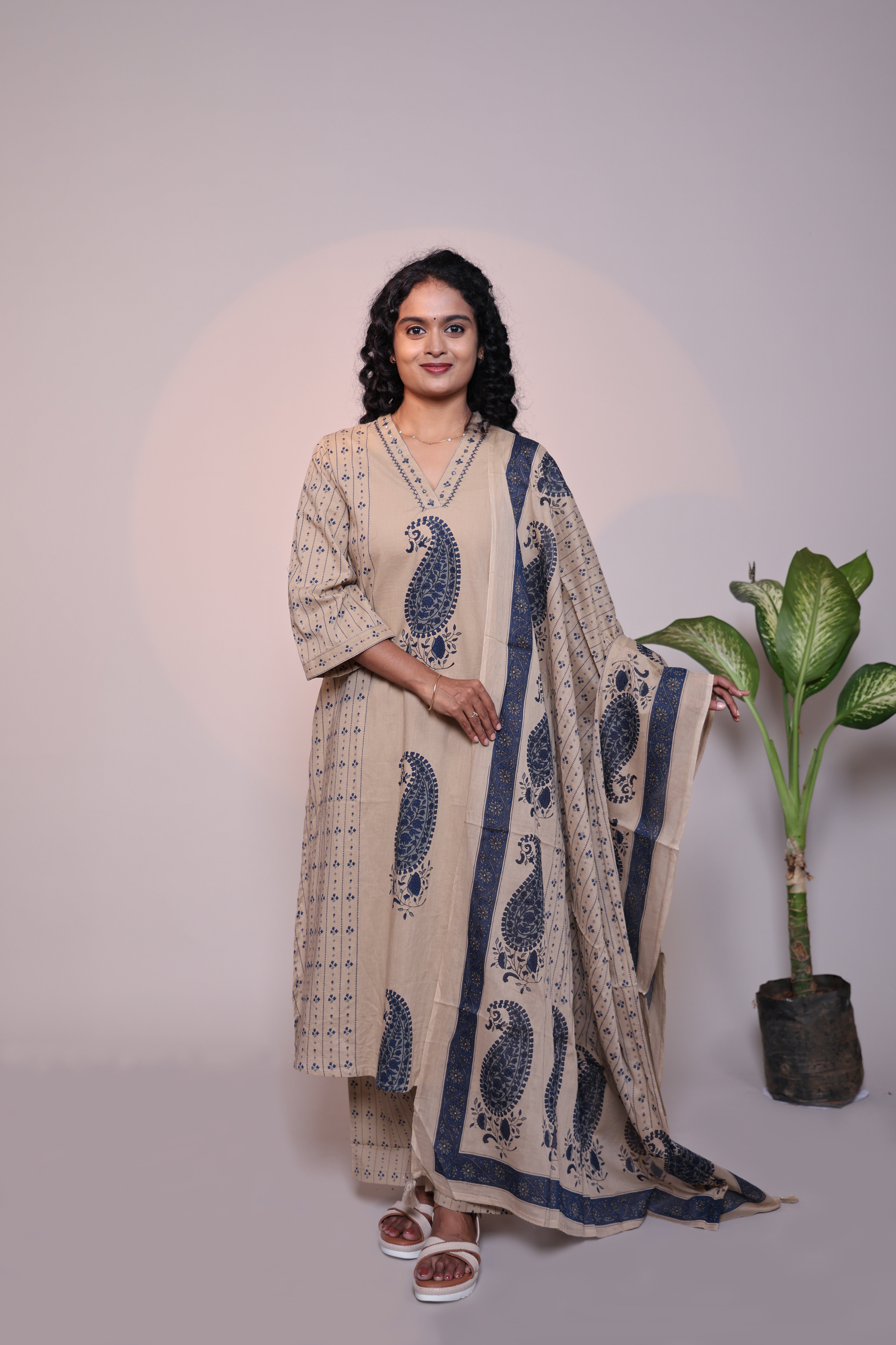 Light brown floral motifs 3/4 slevee salwar suit with matching pant and printed dupatta