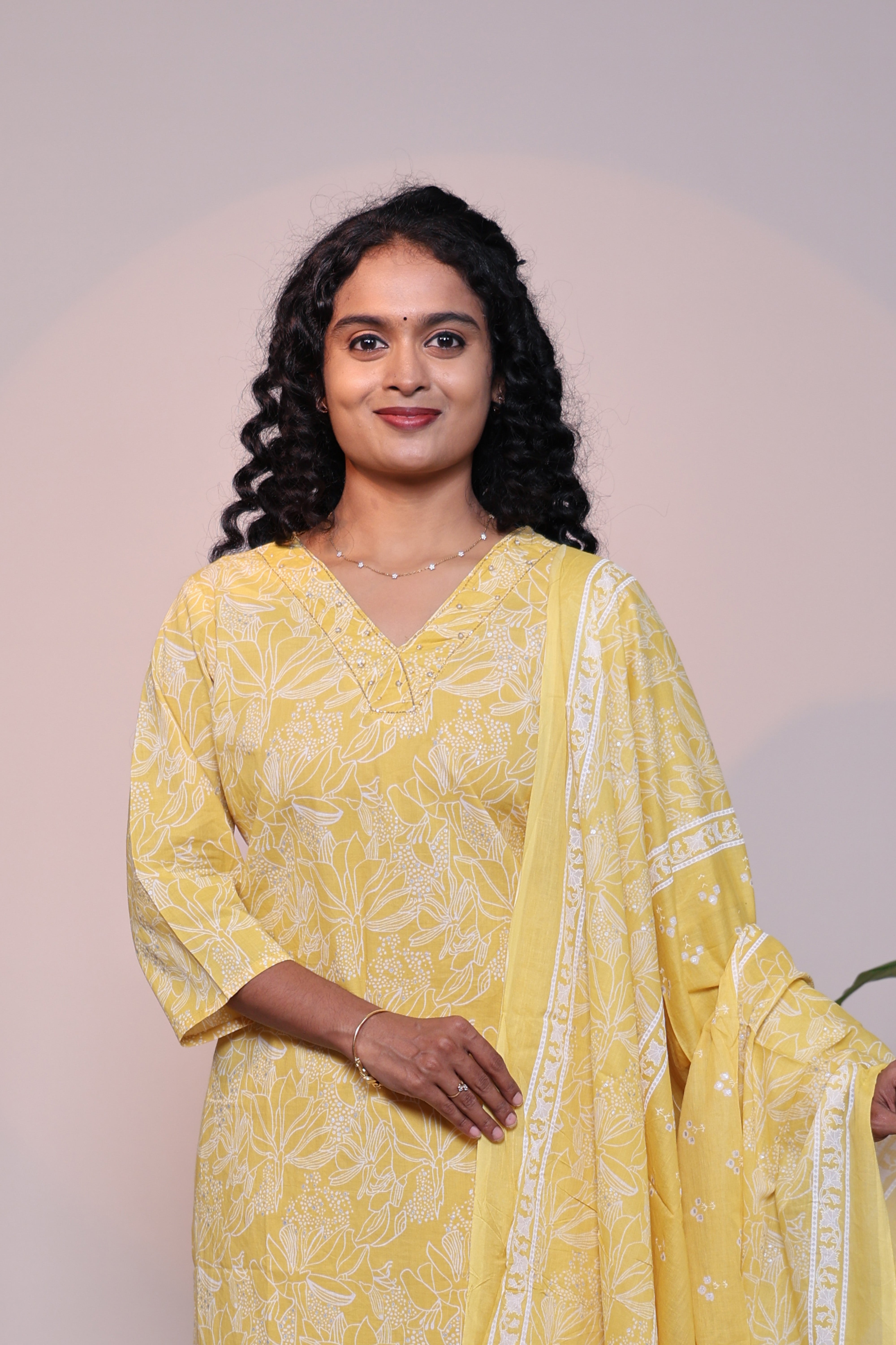 Yellow floral design 3/4 slevee salwar suit with matching pant and floral printed dupatta
