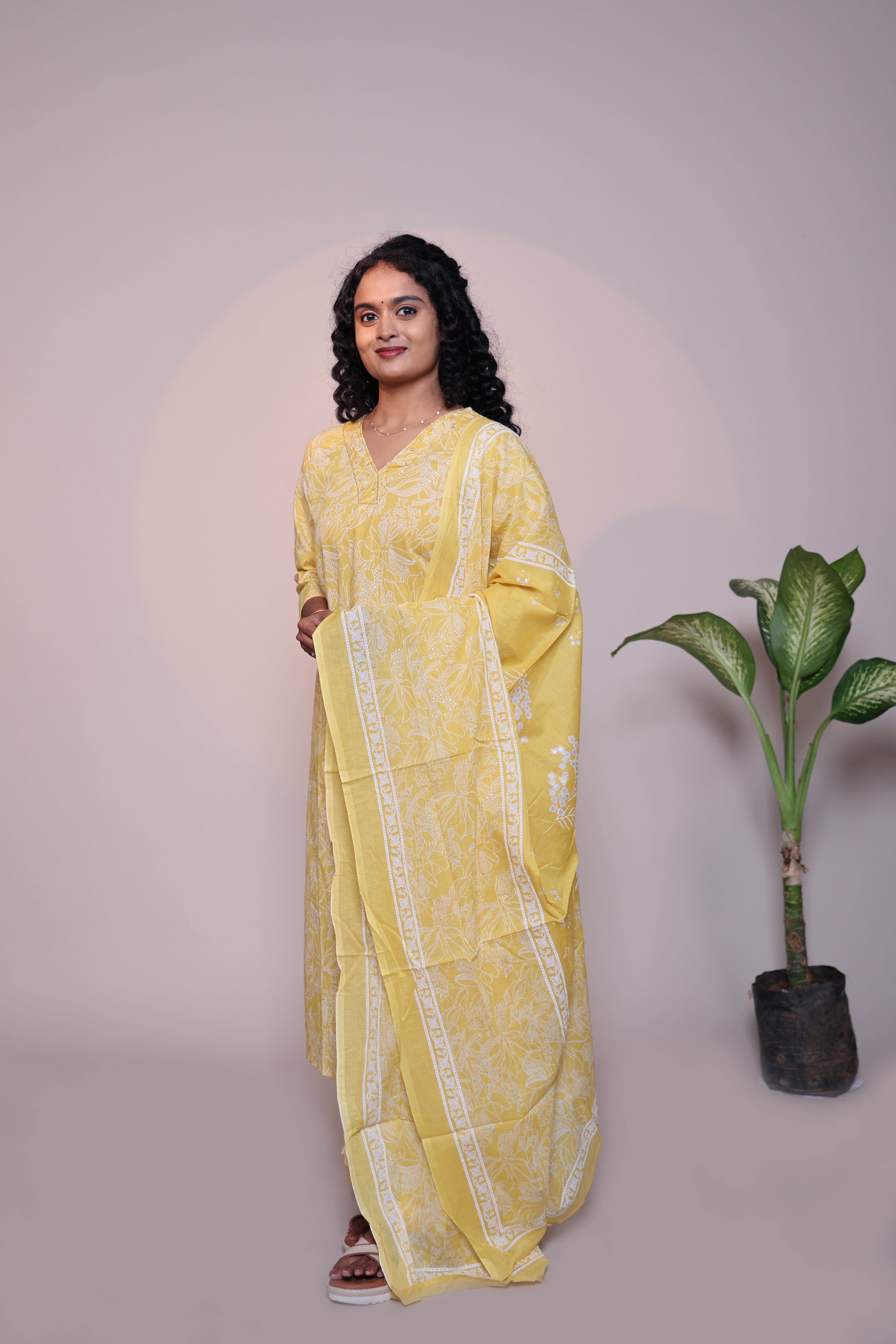 Yellow floral design 3/4 slevee salwar suit with matching pant and floral printed dupatta