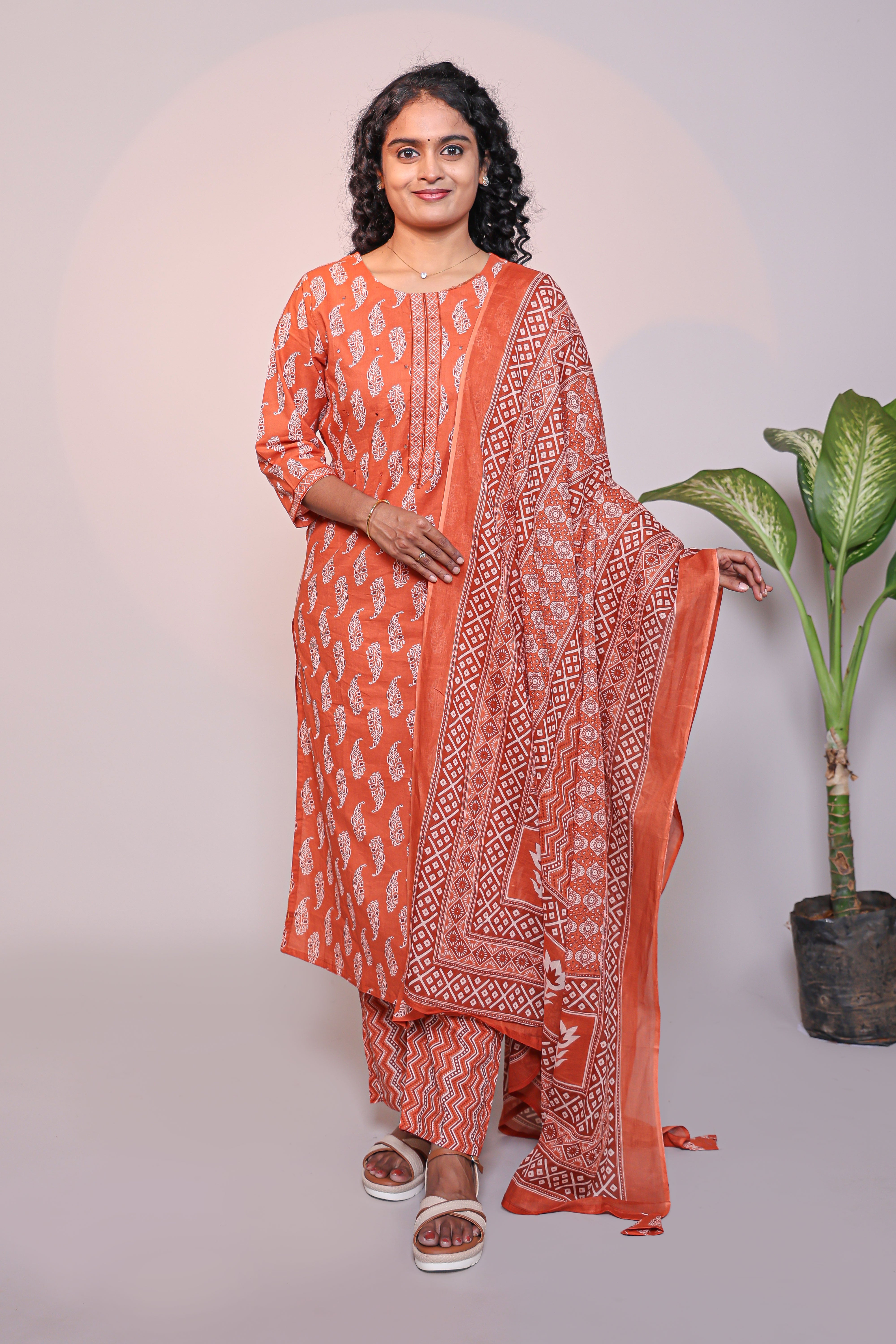 Orange motifs design 3/4 slevee salwar suit with matching pant and floral printed dupatta