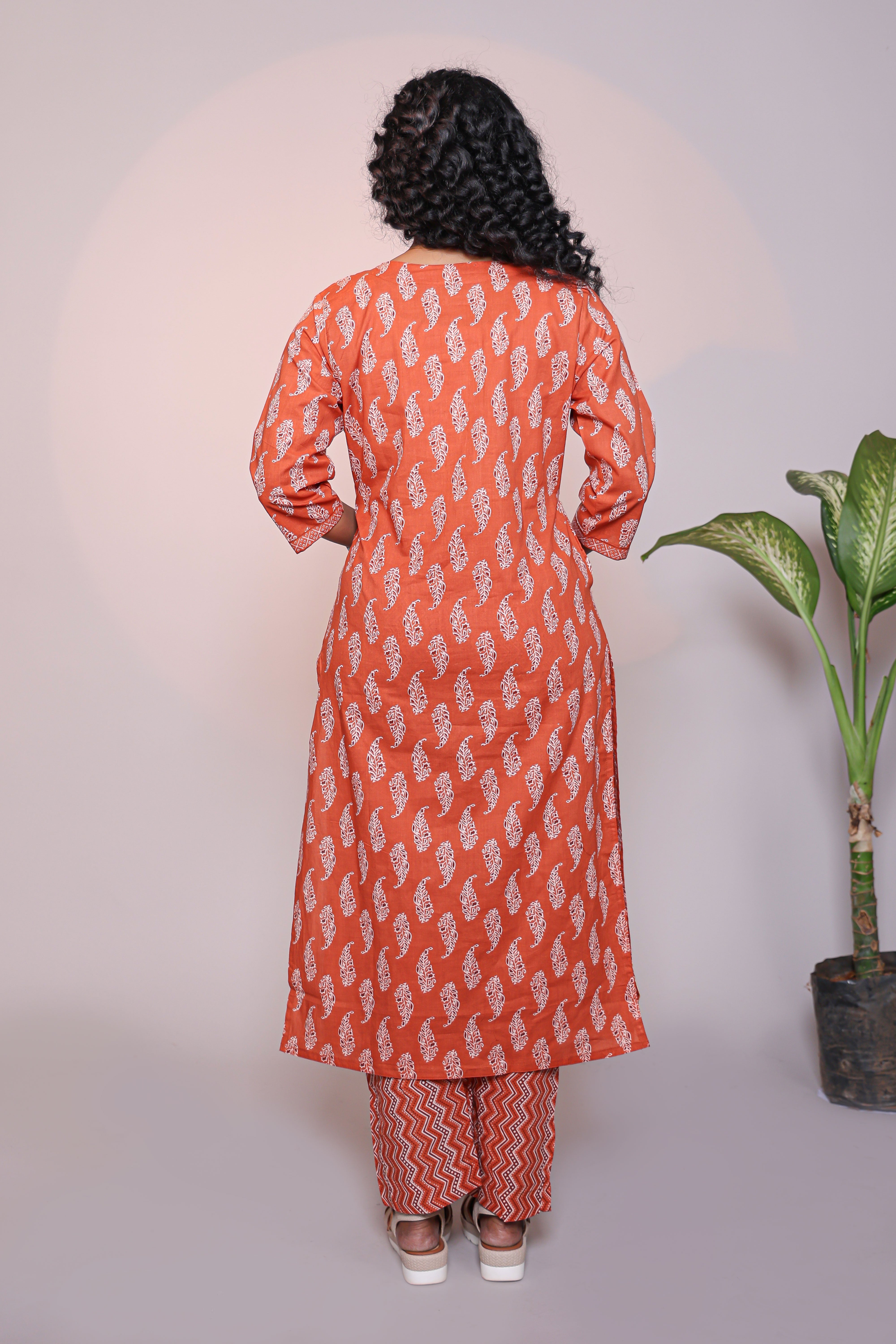 Orange motifs design 3/4 slevee salwar suit with matching pant and floral printed dupatta